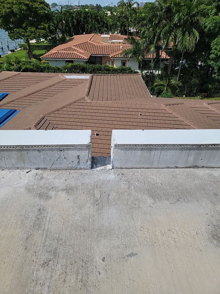 Flat Roof White Membrane and Insulation Installation in Miami Beach by AJF ROOFING INC