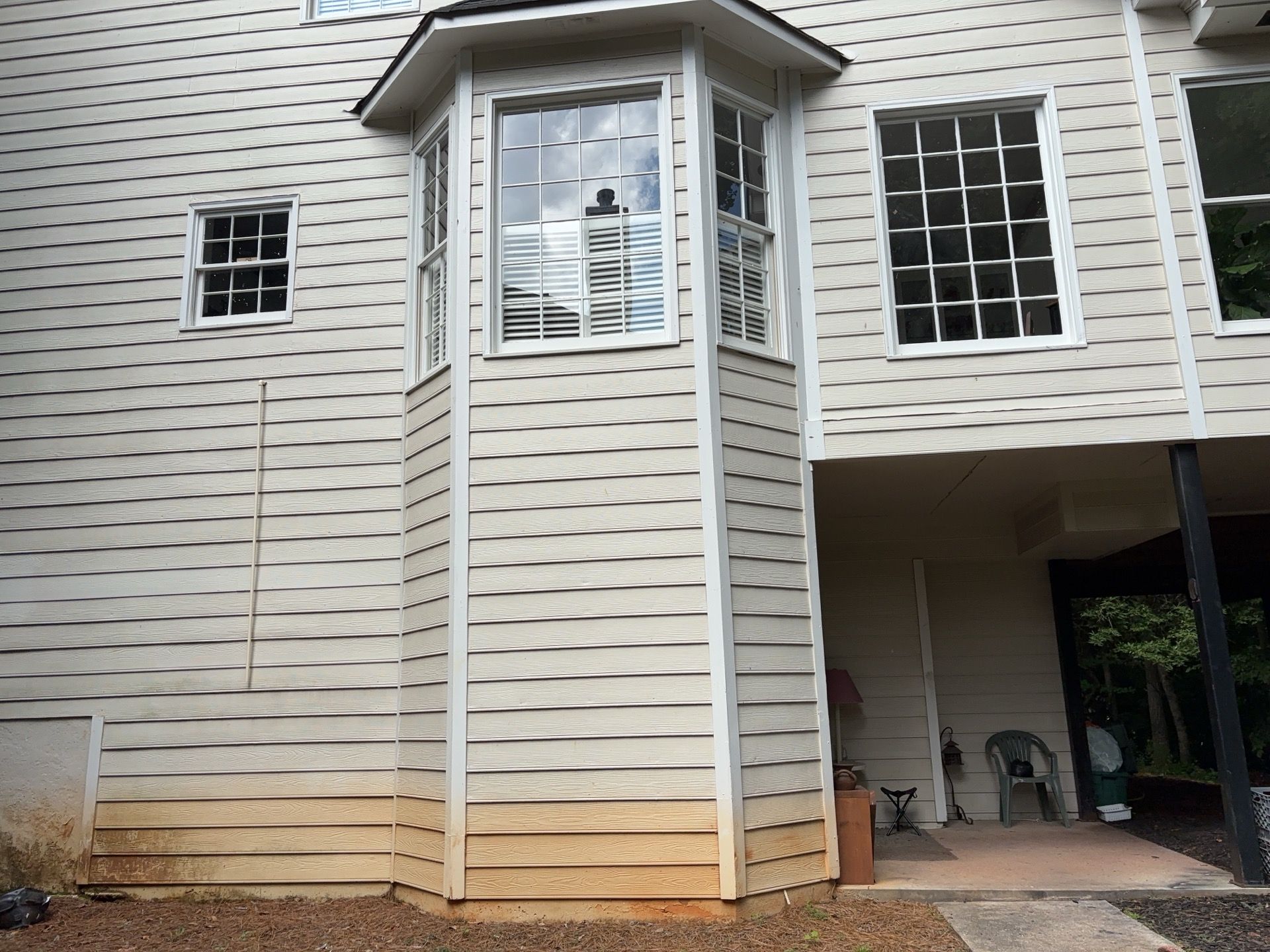 Blue Exterior Paint and Siding Installation using James Hardie Lap Siding by Nelson Exteriors