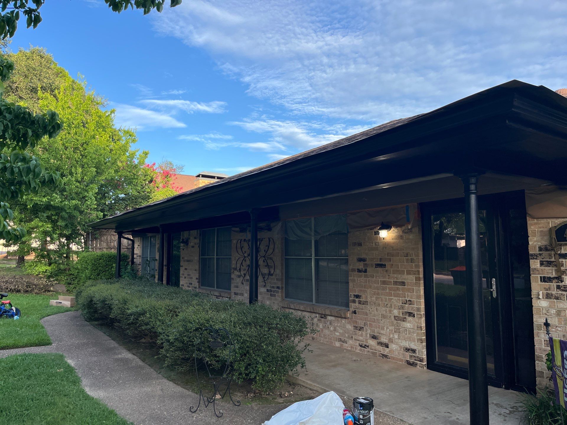 Exterior Painting in Tyler, TX | Eaves, Door & Columns in Elegant Black by Quality Coats Painting