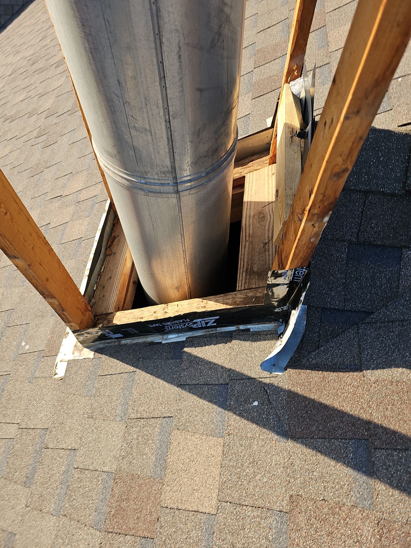 chimney repair using lap engineered treated composite siding. by road roofing llc