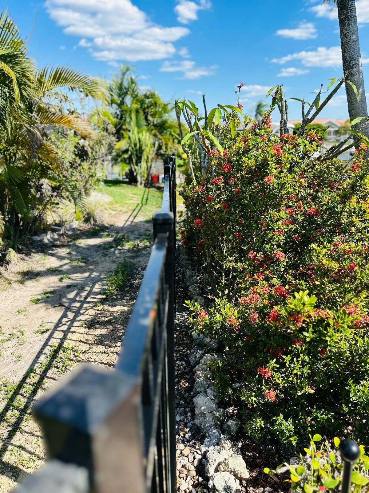 Waterfront Aluminum Picket Fence Installation in Punta Gorda by True Fence LLC