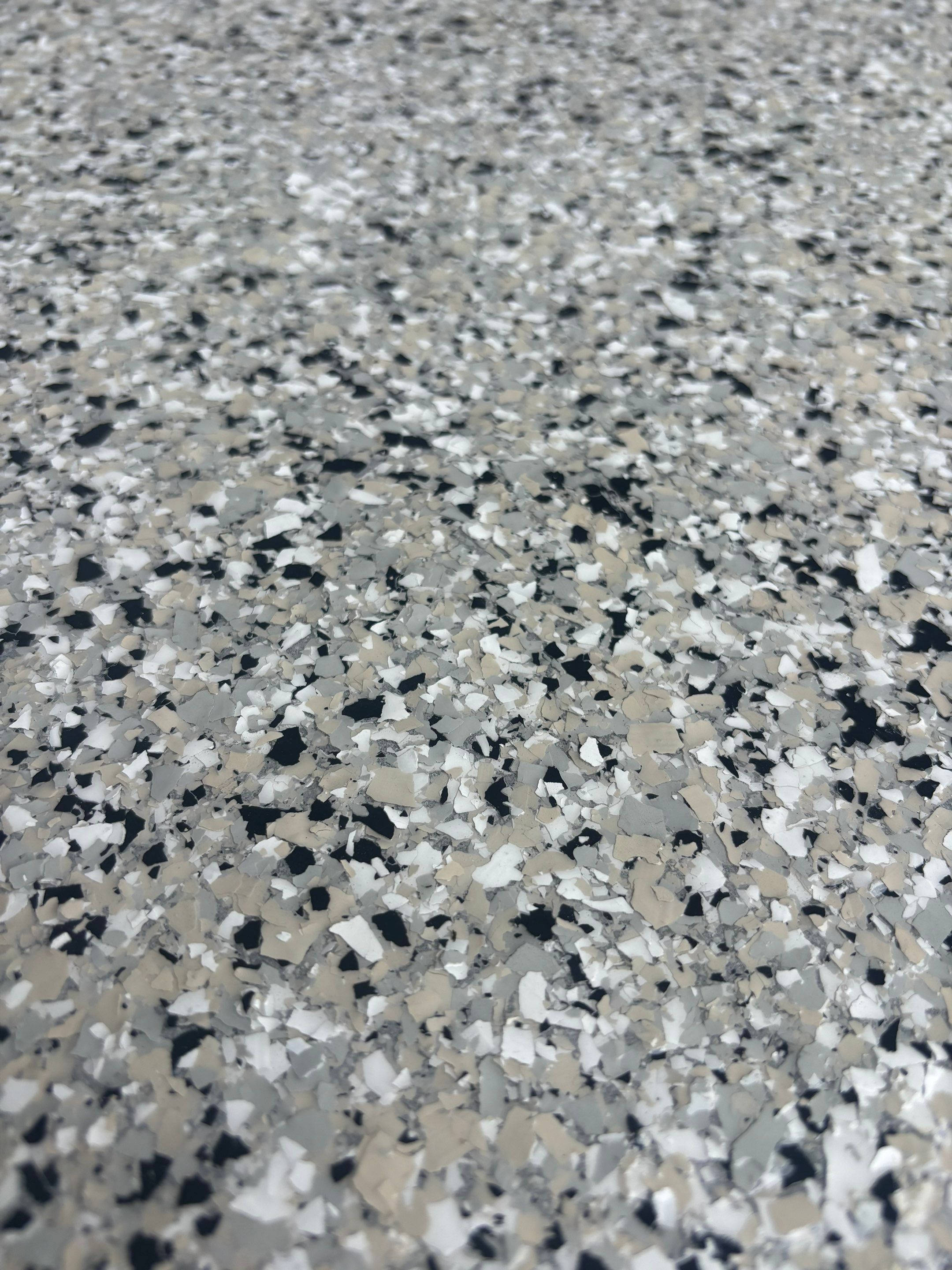 Three-Stall Garage Epoxy Floor Coating Installation in Lincoln by Goat Coatings