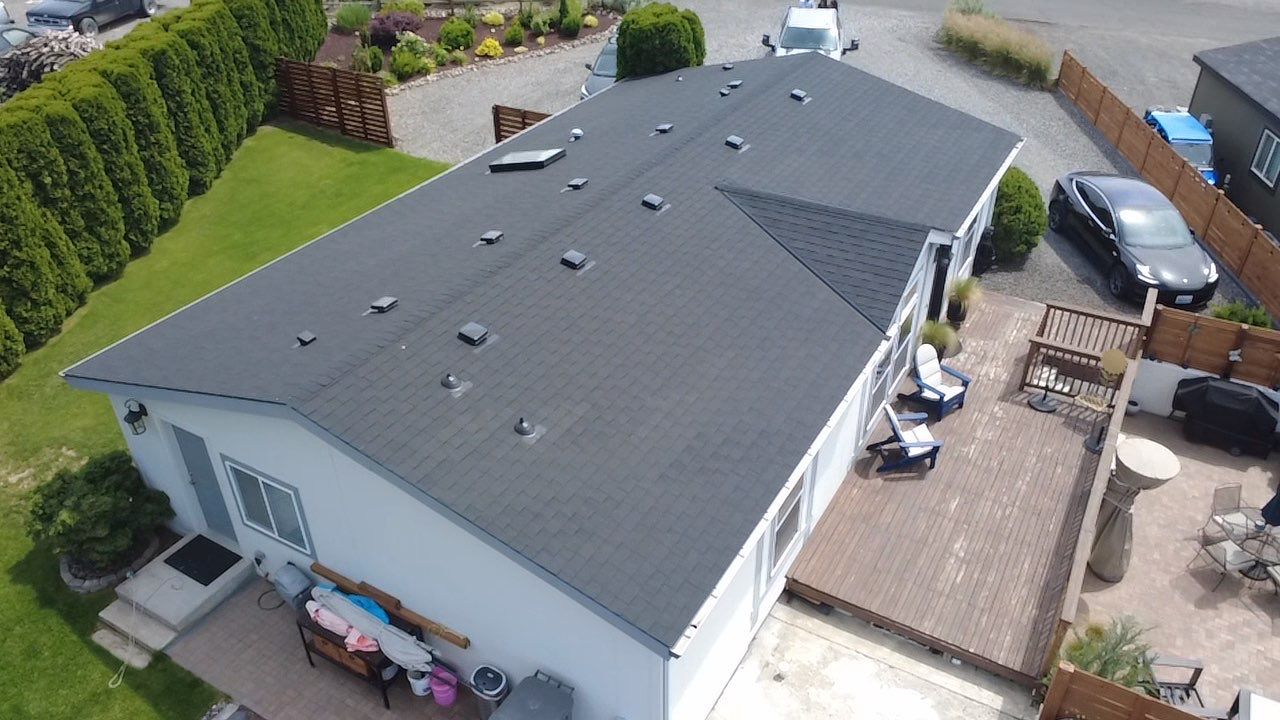 Residential Roof Replacement with Architectural Shingles and Skylight in Date Place Mattawa, WA 99349 The Denali System - 5-Star SureStart PLUS Coverage - CertainTeed 50 Year Material Guarantee - CertainTeed Workmanship Guarantee: 30 Years - CertainTeed Warranty Transfer Period: 20 Years - Certainteed Landmark® Shingle - Cinder Black by Alpine Roofing