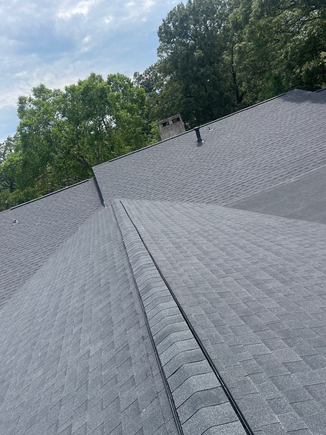 Residential Roofing Installation using Roof Replacement by American Roofing & Construction LLC