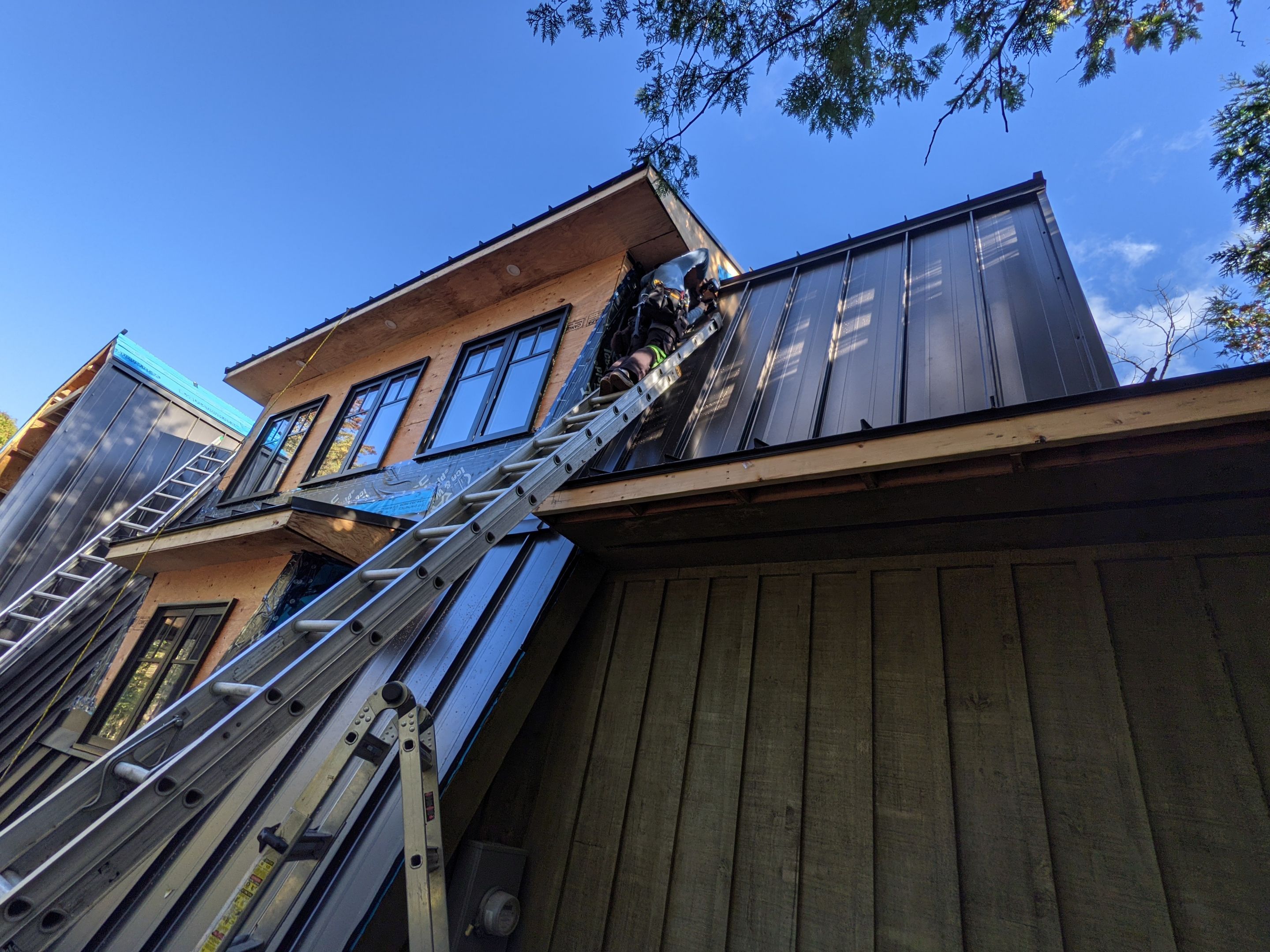 Residential Roofing Installation using 16" Standing Seam Panels by Jay Carter Roofing & Sheet Metal