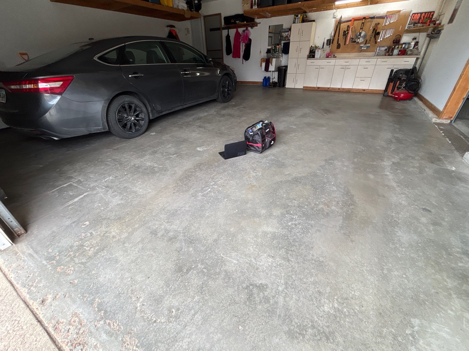 Gray and Black Speckled Polyurea Garage Floor in Dell Rapids by Select Painting, Coatings & Garage Cabinets