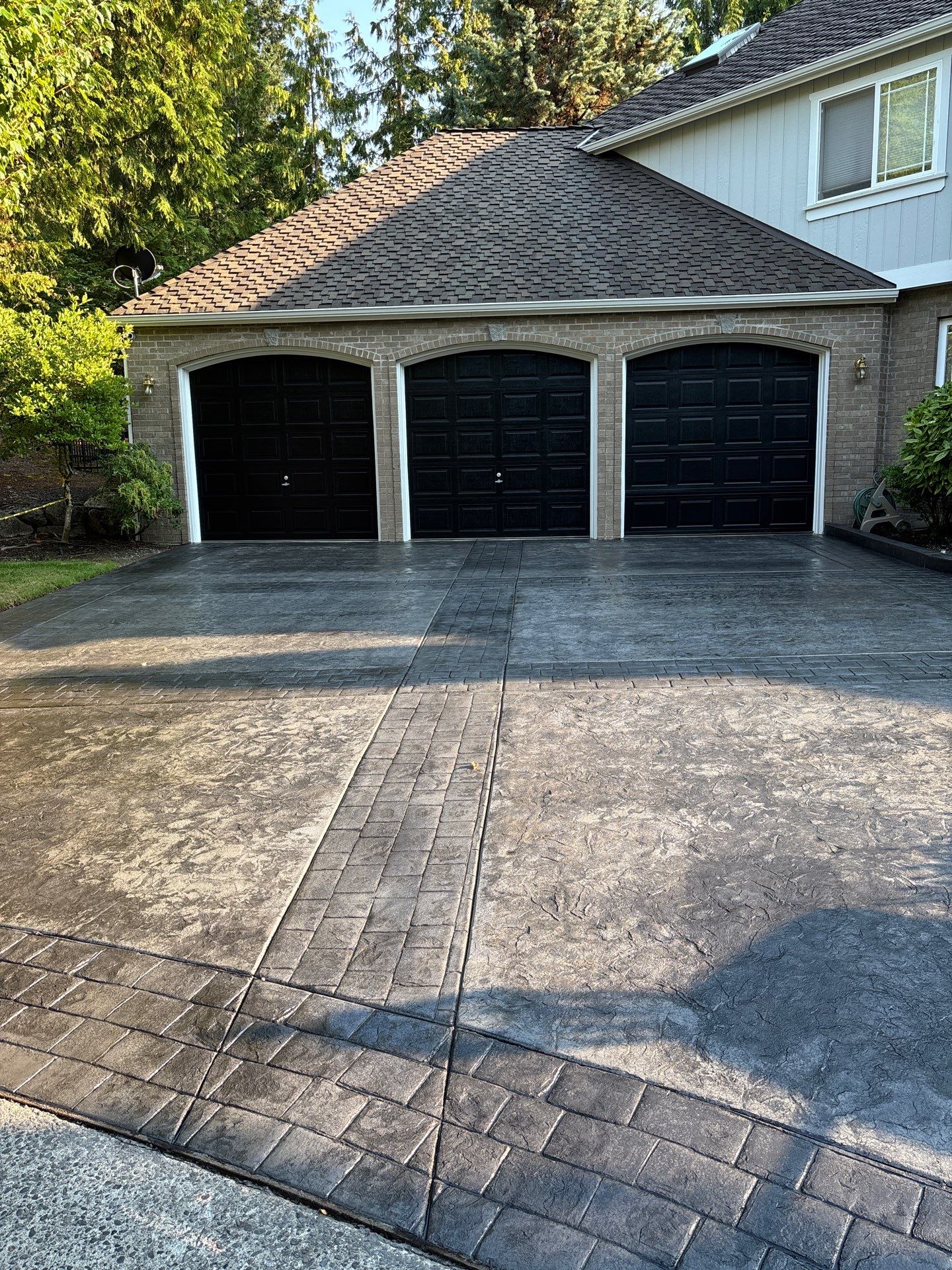 Multi-color Stamped & Sealed Concrete Driveway Renovation | Mukilteo by Jireh Asphalt & Concrete Inc