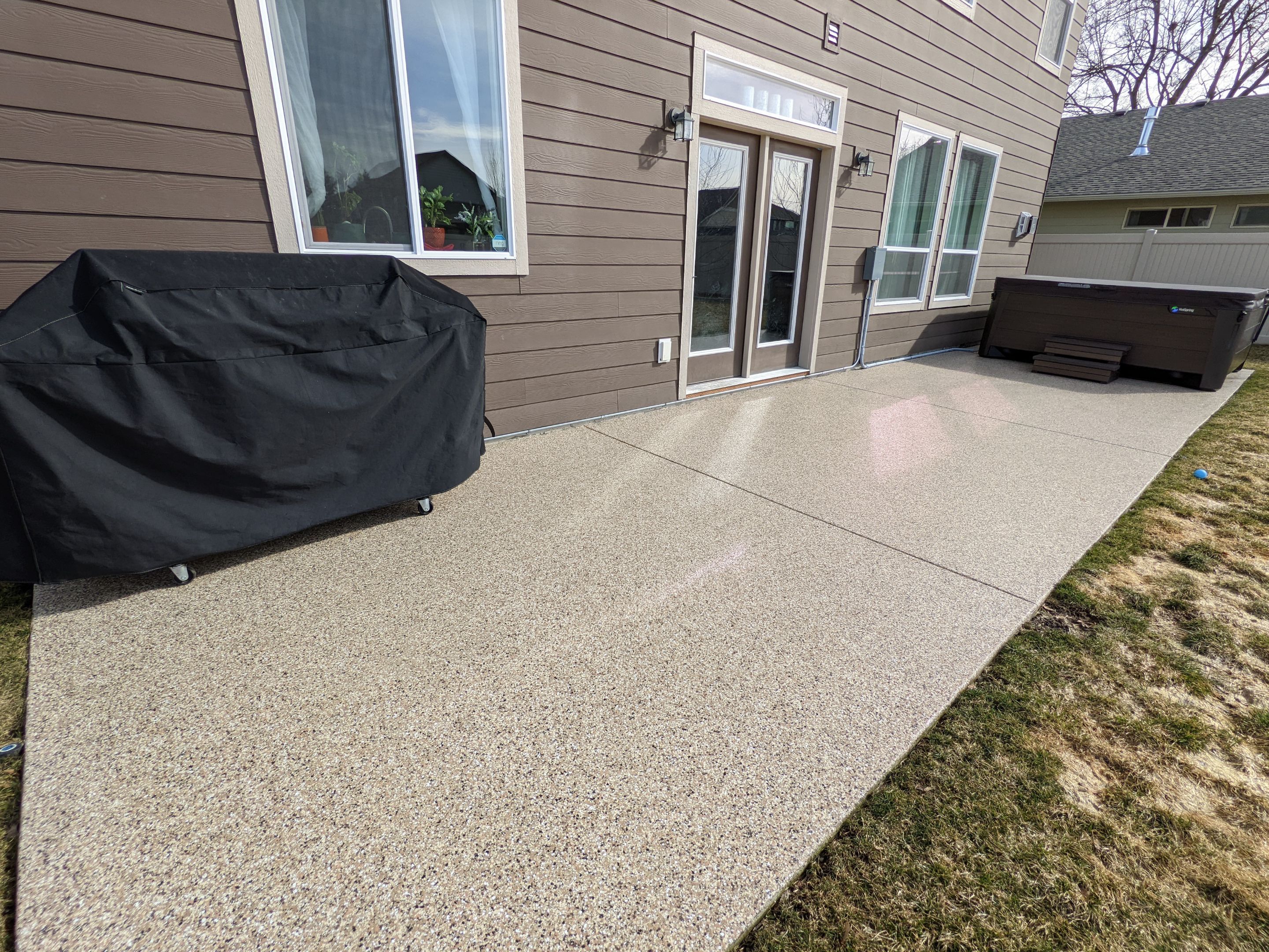 Patio Transformation using Sandstone by Croc Coatings, LLC