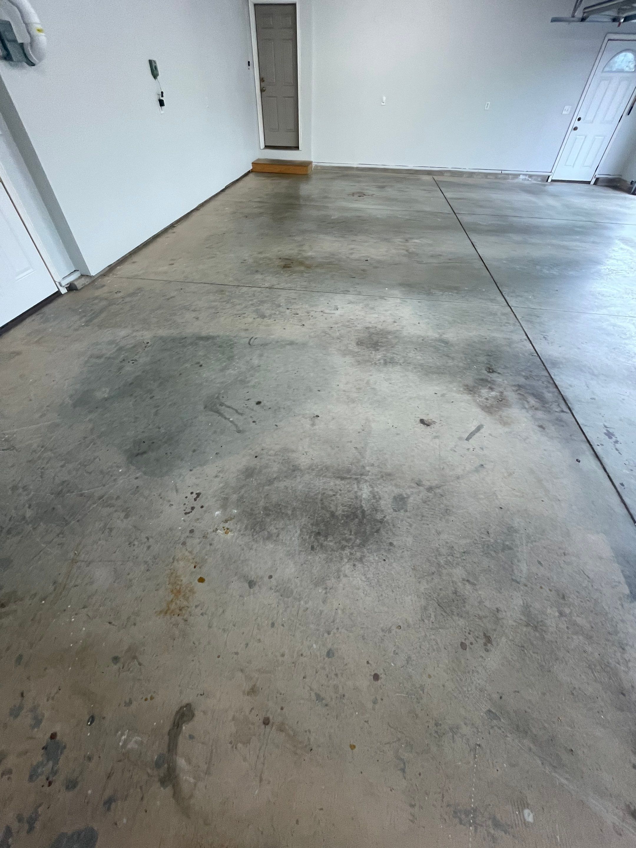 Multi-Car Garage Floor Coating and Crack Repair in Tea by Select Painting, Coatings & Garage Cabinets