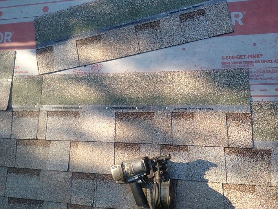 Residential Roofing Installation using Roof Replacement by American Roofing & Construction LLC
