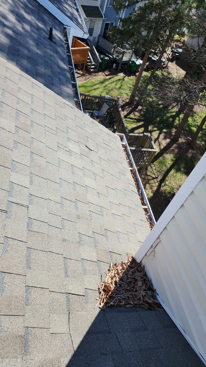 Gutter Cleaning using water by Power Wash Masters LLC