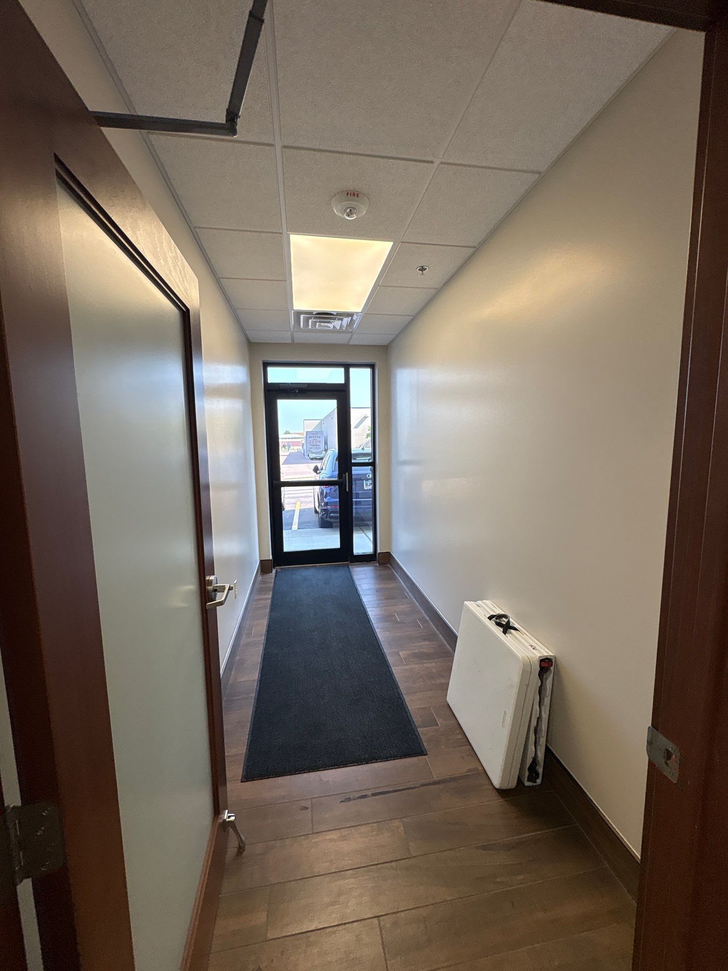 Commercial Office Interior Remodel and Modern Suite Refresh in Sioux Falls by Select Painting, Coatings & Garage Cabinets