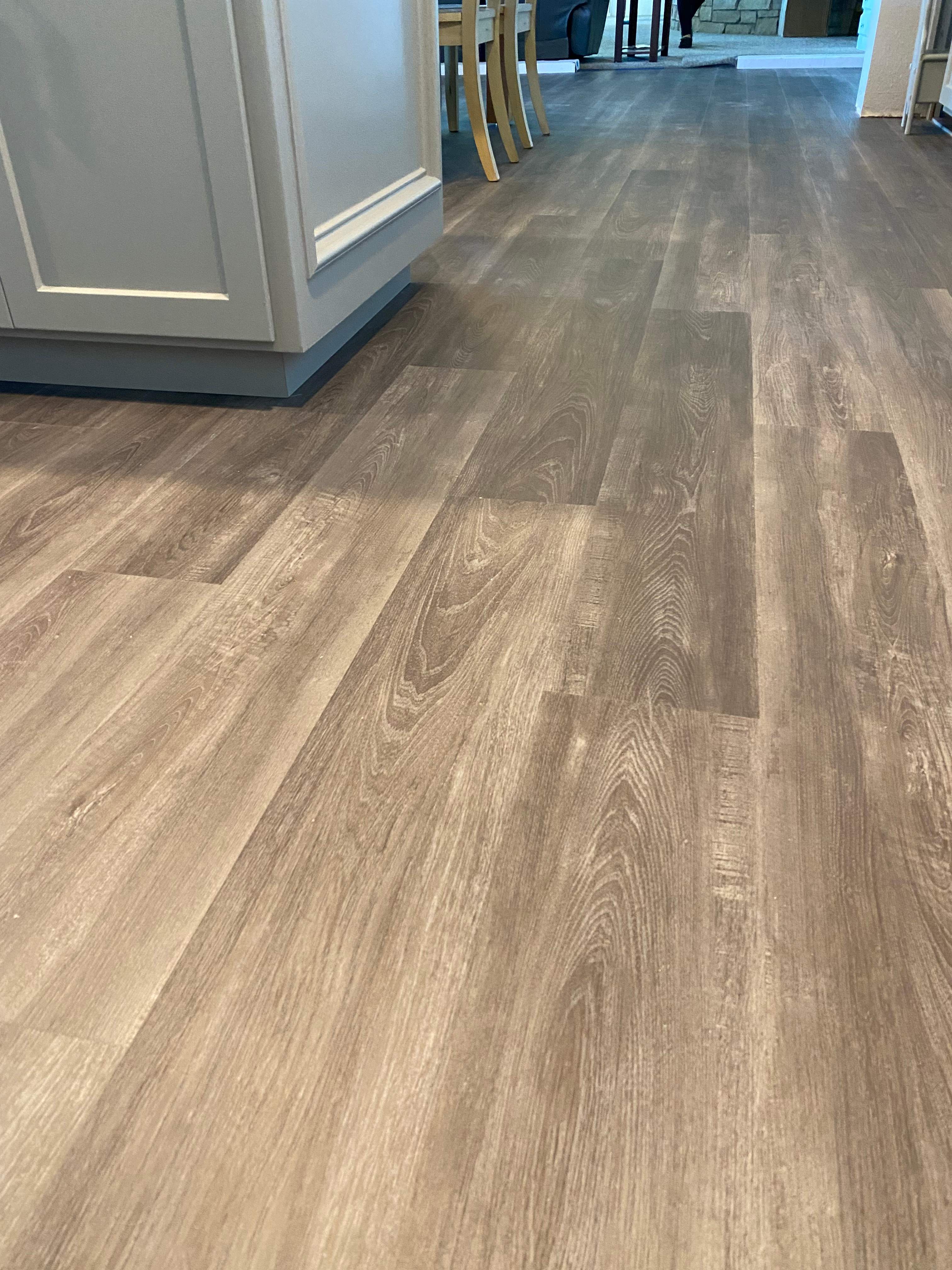 LVP Flooring for newly remodeled kitchen in Newcastle. by Footprints Floors South Sacramento