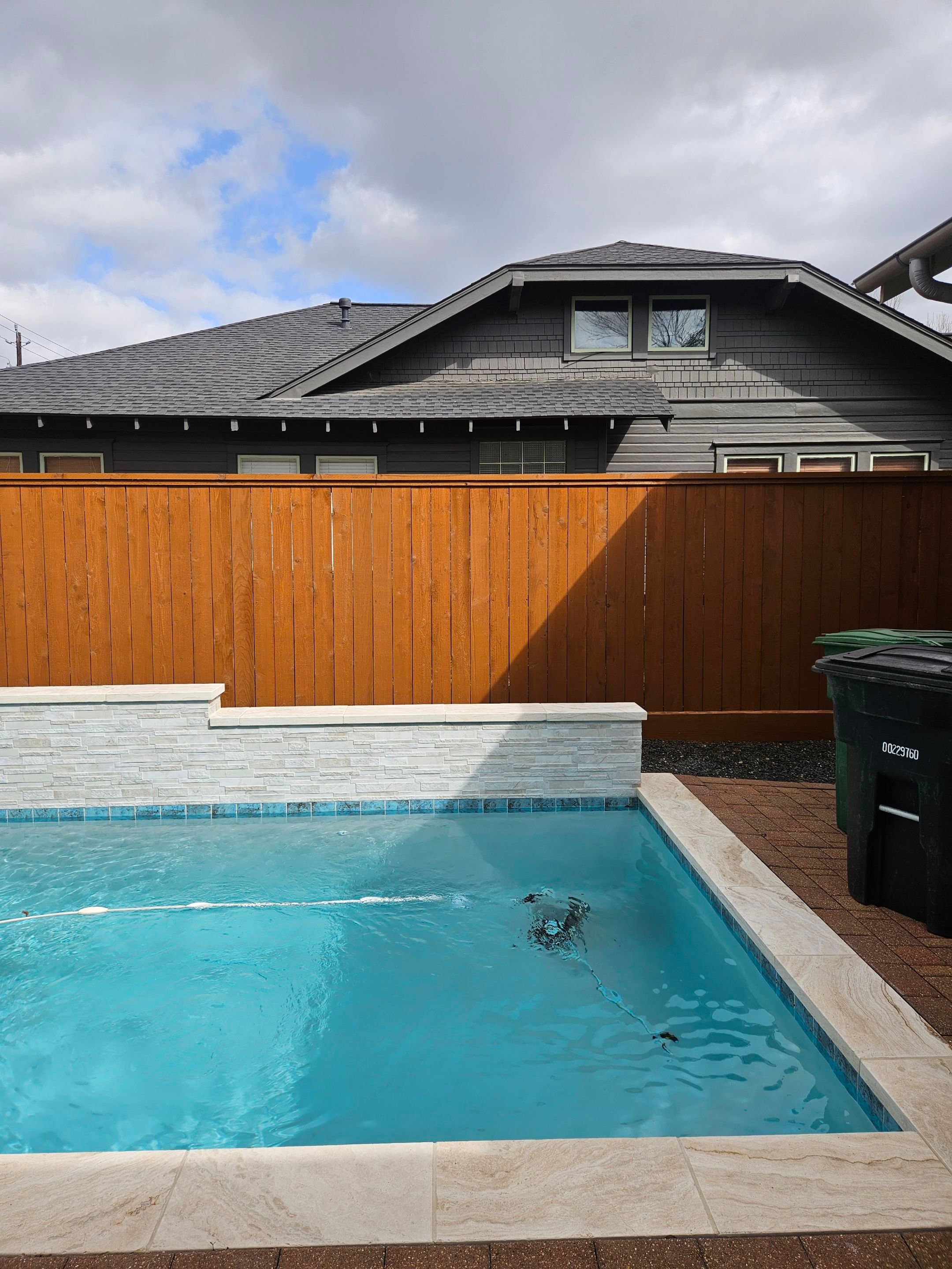 Durable Fence & Gate Installation with Premium Stain by Tim's Fences