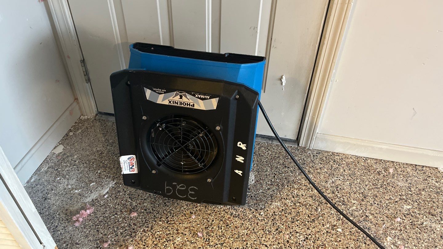 Interior Water Damage Affecting the Garage and Kitchen  by ANR Restoration