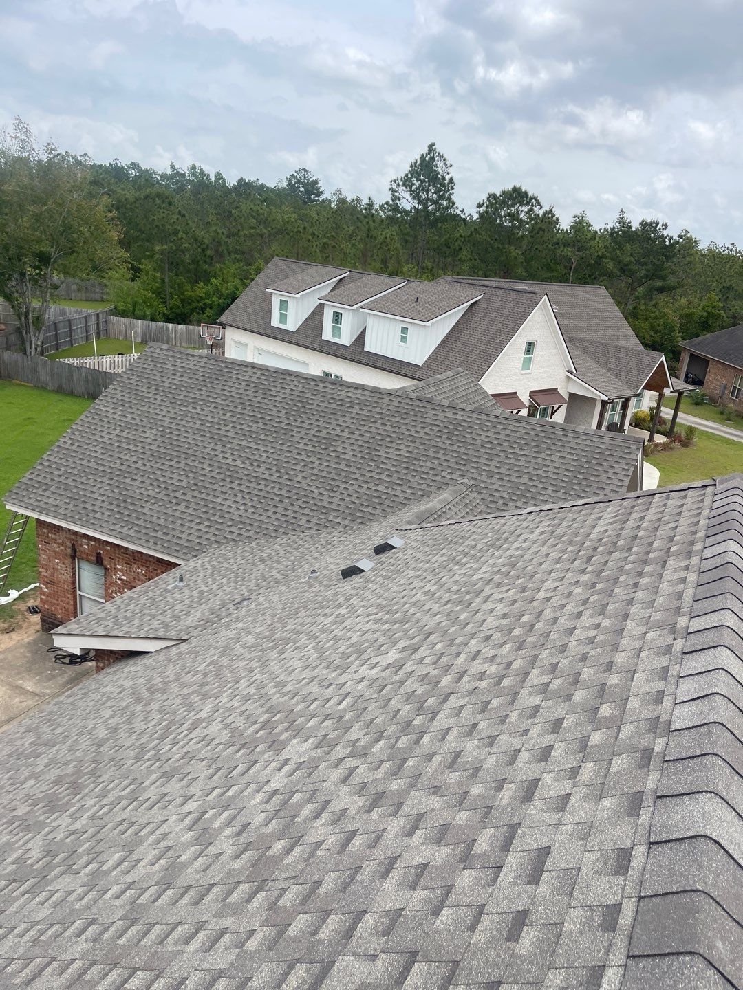 Residential Roofing Installation using Roof Replacement by American Roofing & Construction LLC