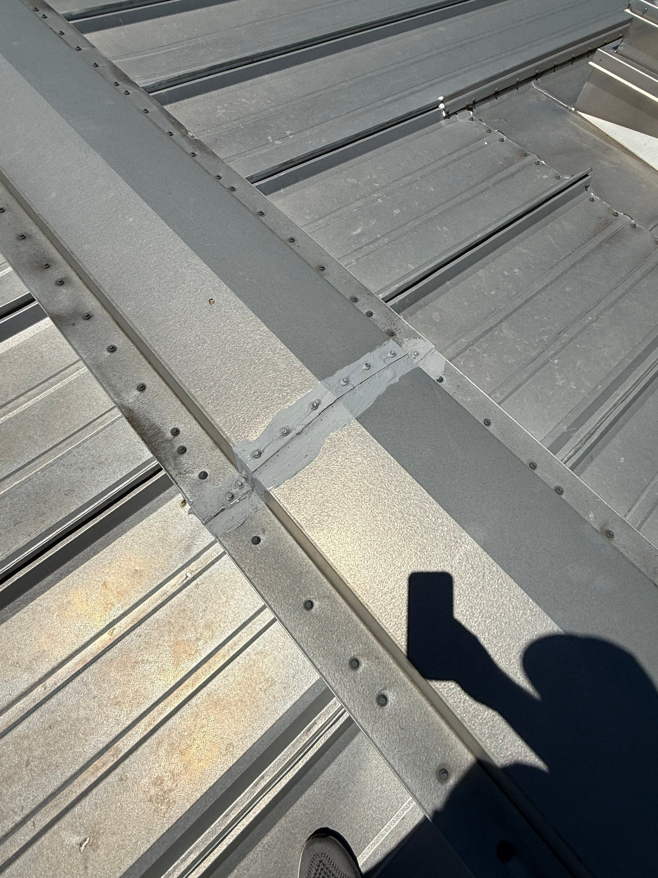 Commercial Metal Roof Repair and Skylight Sealing in West Memphis by Revival Roofing Services