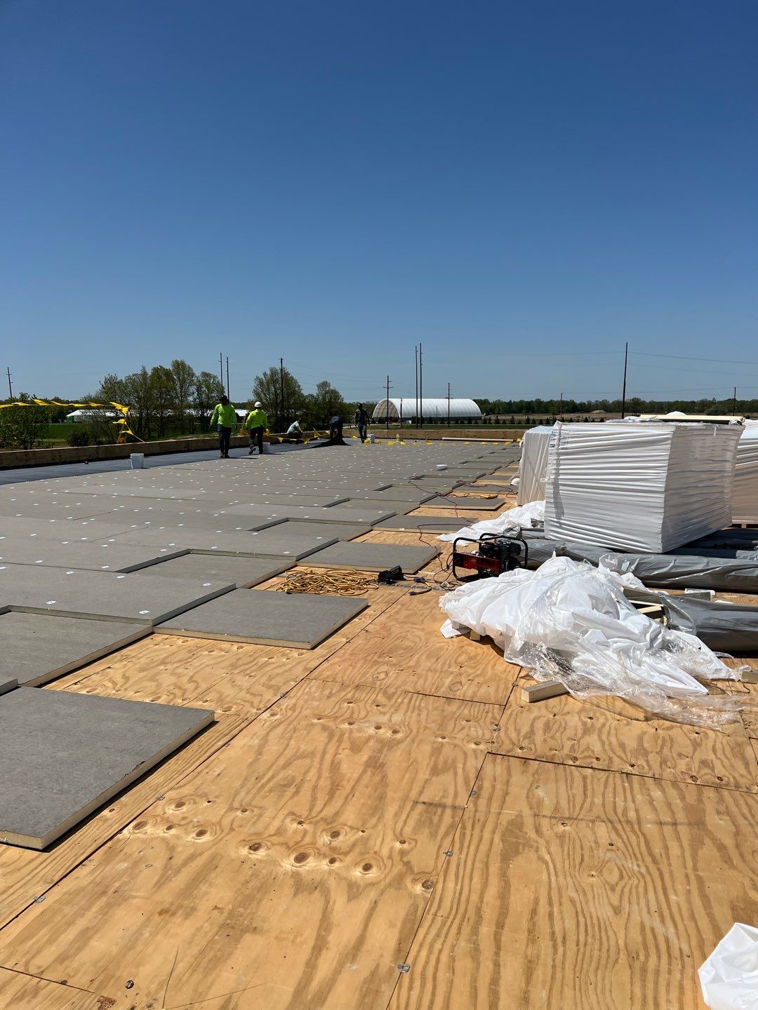Commercial Roofing Installation using 60 mil rubber roof  by Nitro Roofing and Construction