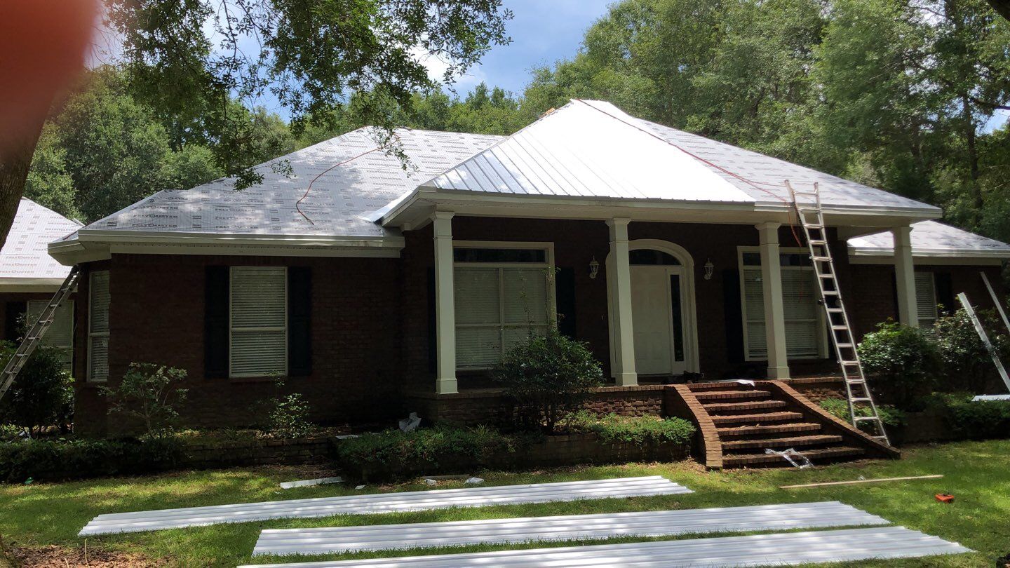 Residential Roofing Installation using Metal roofing by American Roofing & Construction LLC