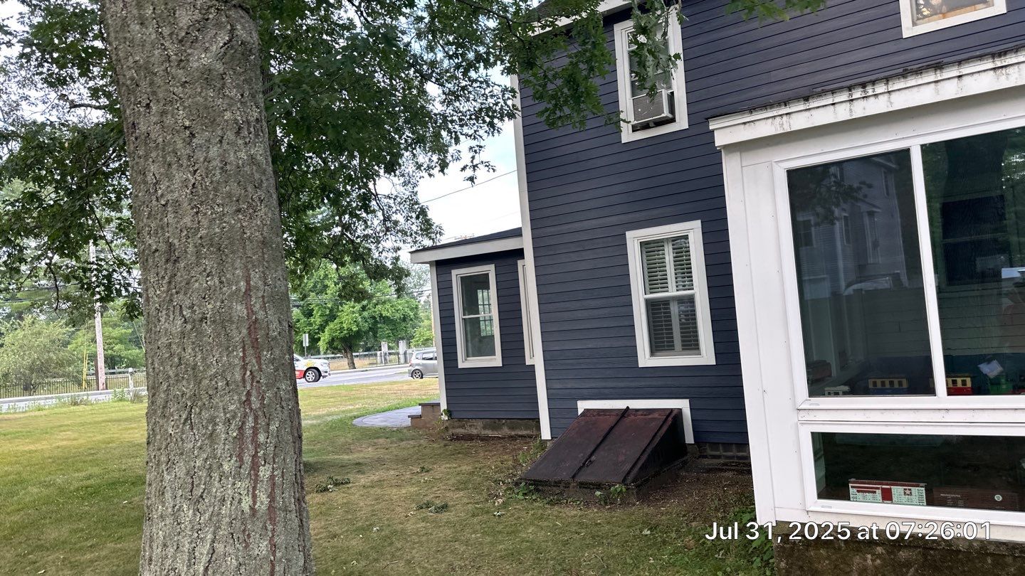 James Hardie Lap Siding Installation in Chelmsford, MA by Mighty Dog Roofing of Greater Middlesex County