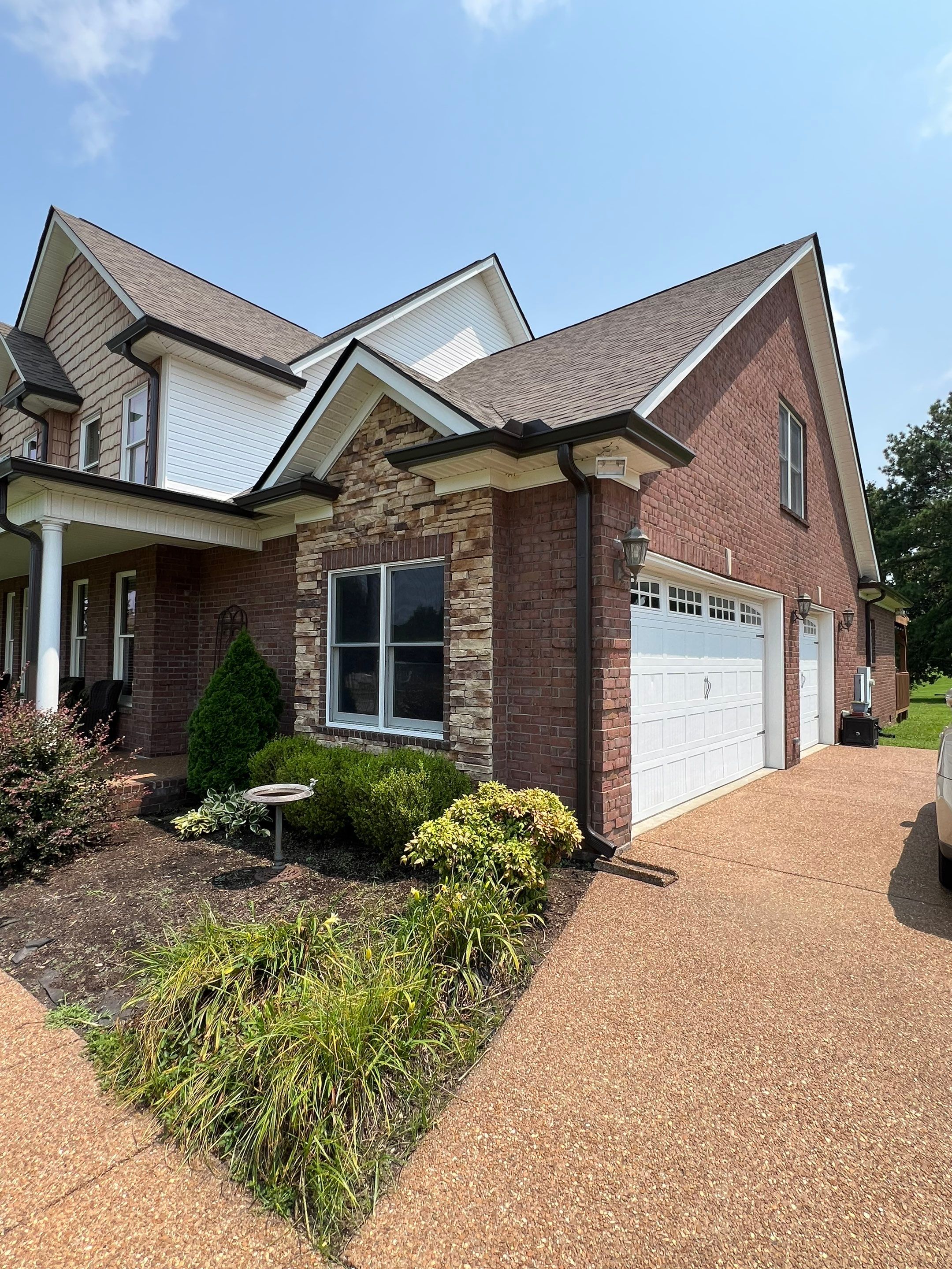 Residential Roofing Installation and Gutter Replacement in Dickson, Tennessee by Shinglesmiths Roofing