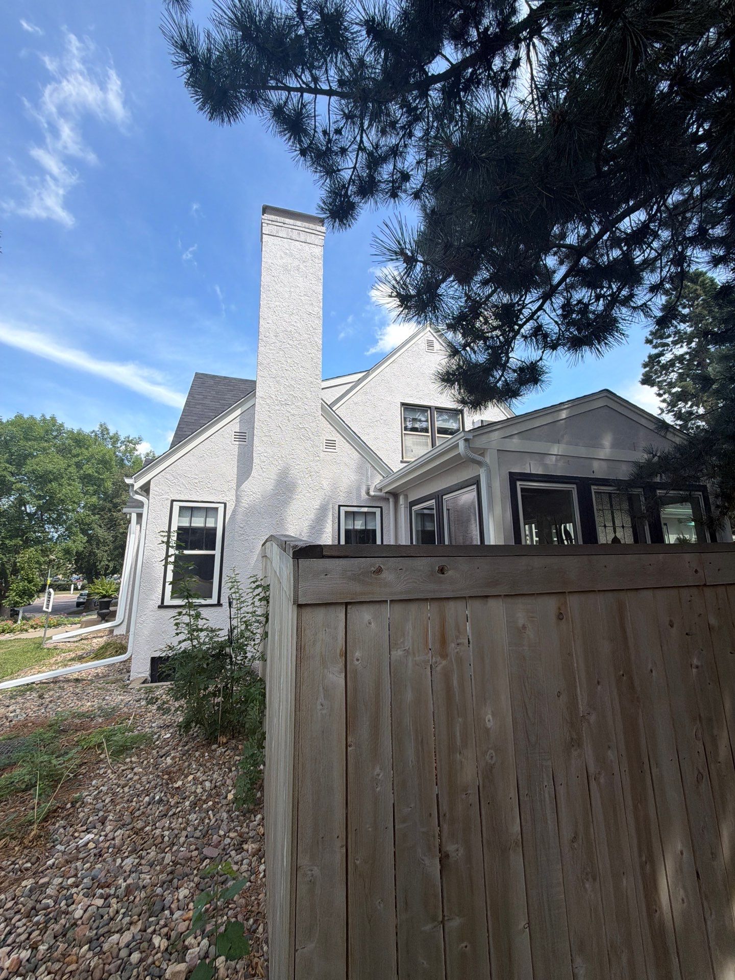 Exterior Stucco Painting and Trim Refresh in Sioux Falls by Select Painting, Coatings & Garage Cabinets