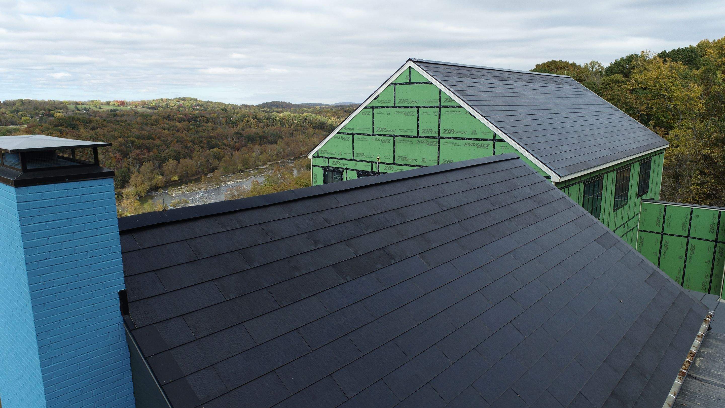 Roof Installation using Tesla Solar Roof V3 by American Home Contractors