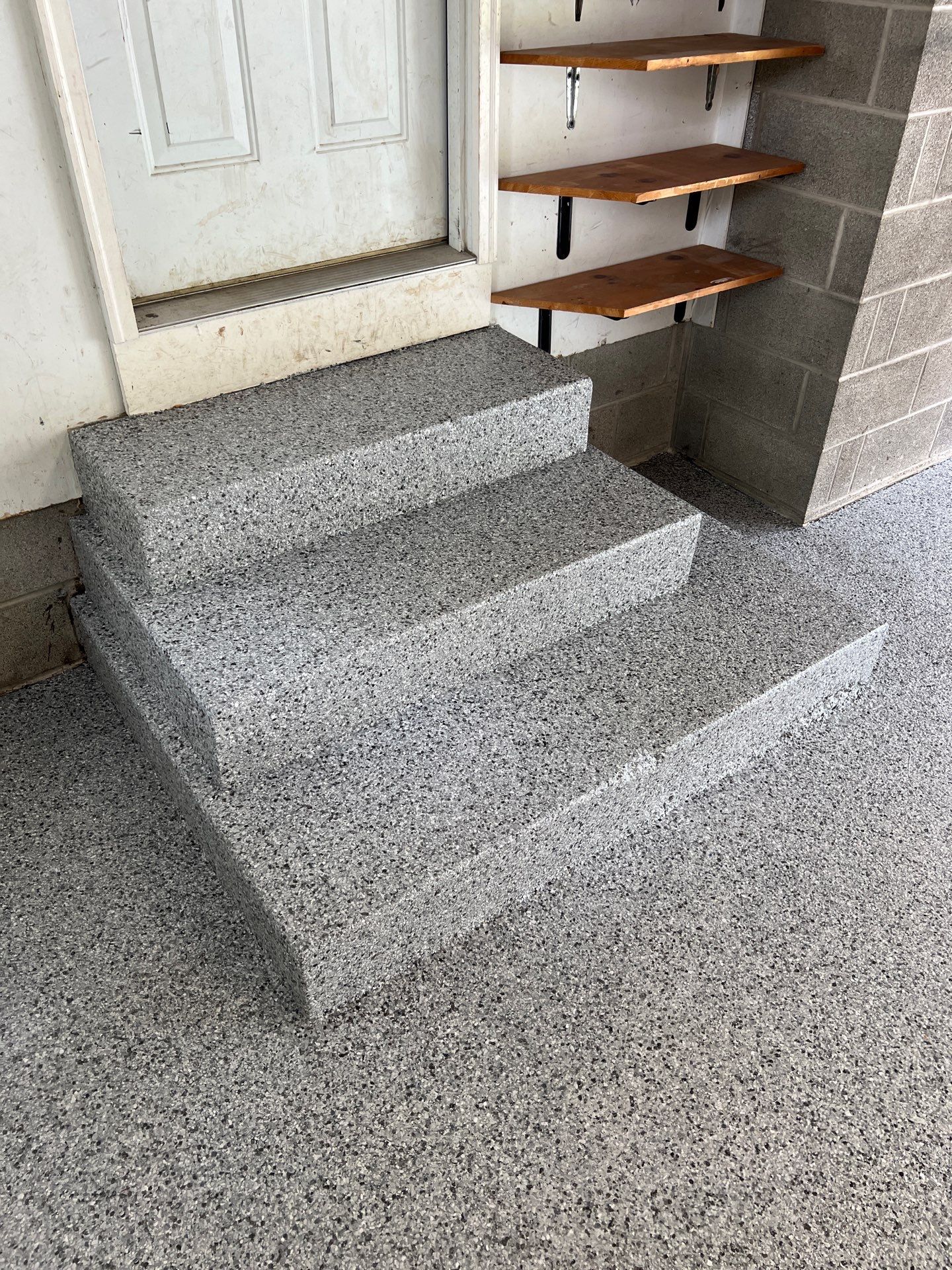 Silverado garage floor coating by NG Masonry & Construction LLC