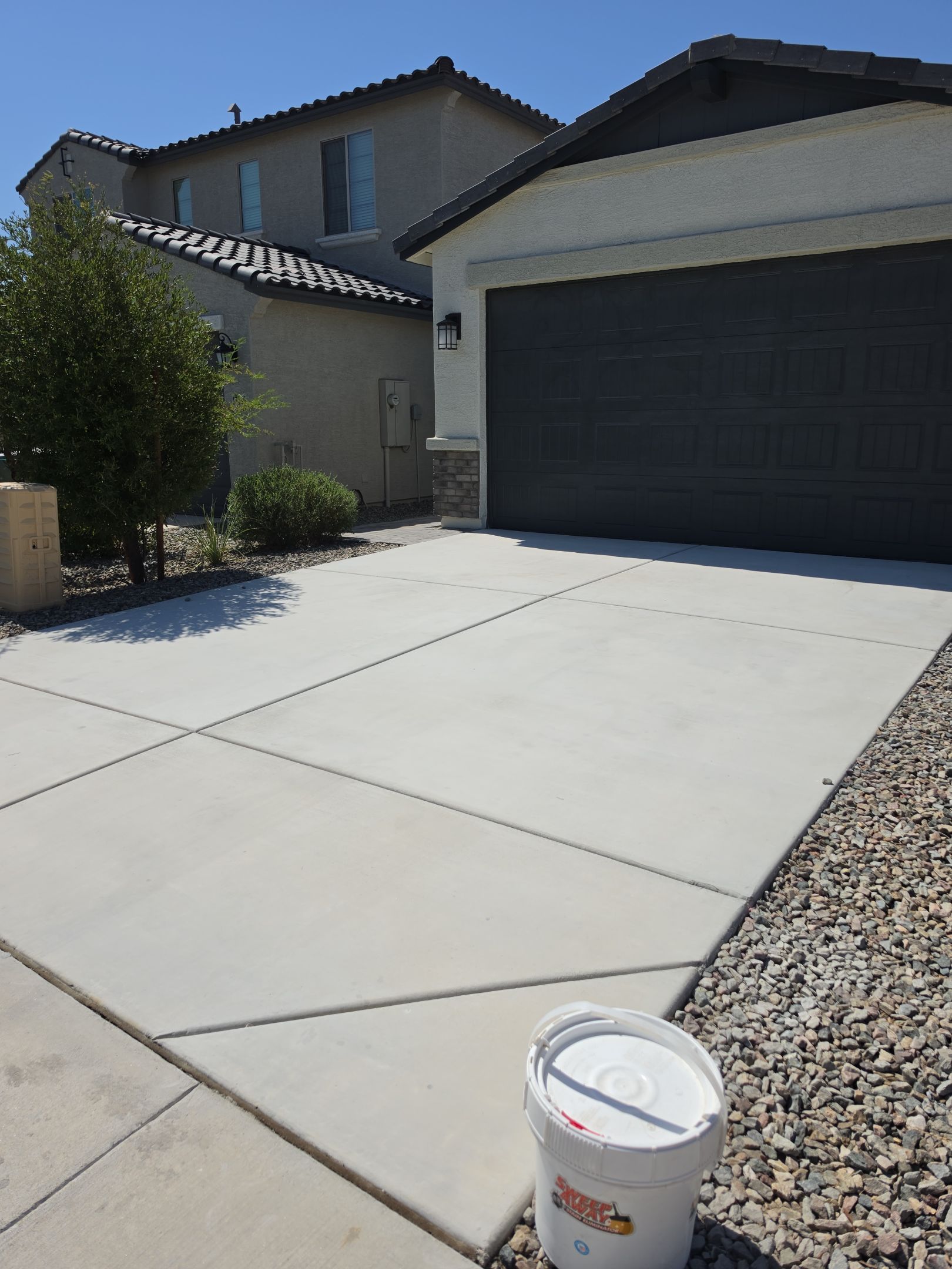 Driveway Oil Stain & Rust Removal | Surprise, AZ 85388 by Patriot Power Washing & Sanitation