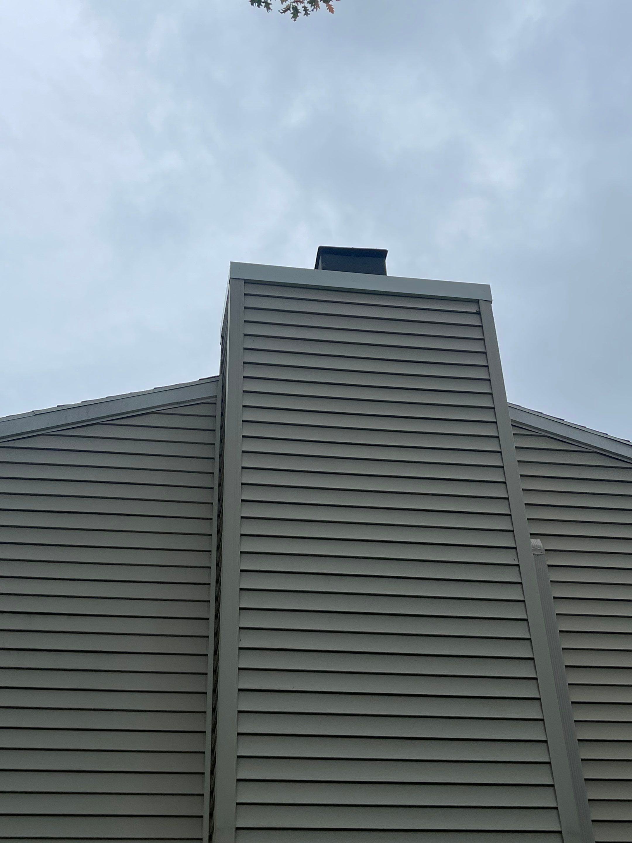 Gutter Cleaning Chimney top repair by A Plus Exterior