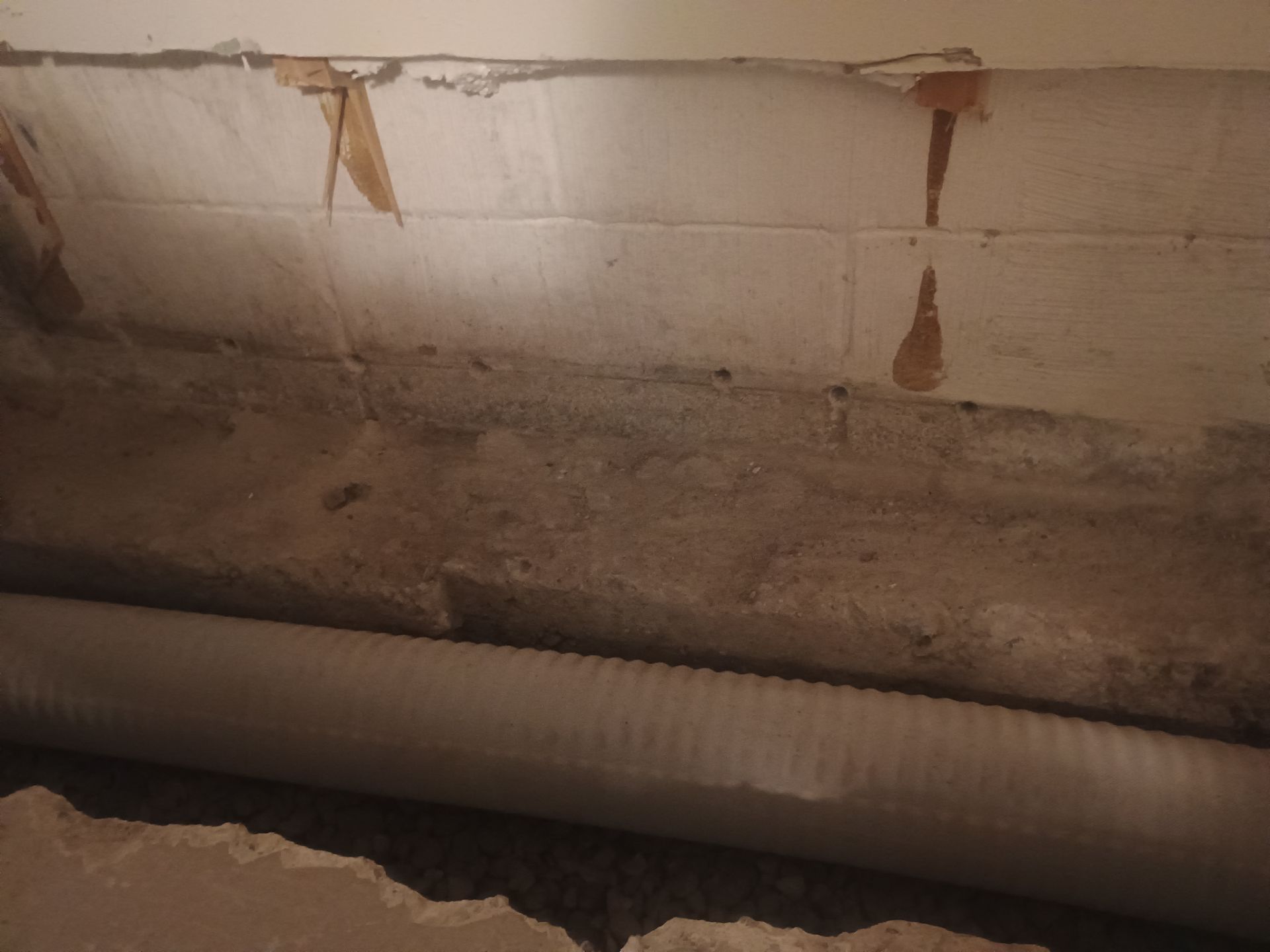 Interior Drain Tile Installation in South Minneapolis by Waterproofing Northeast