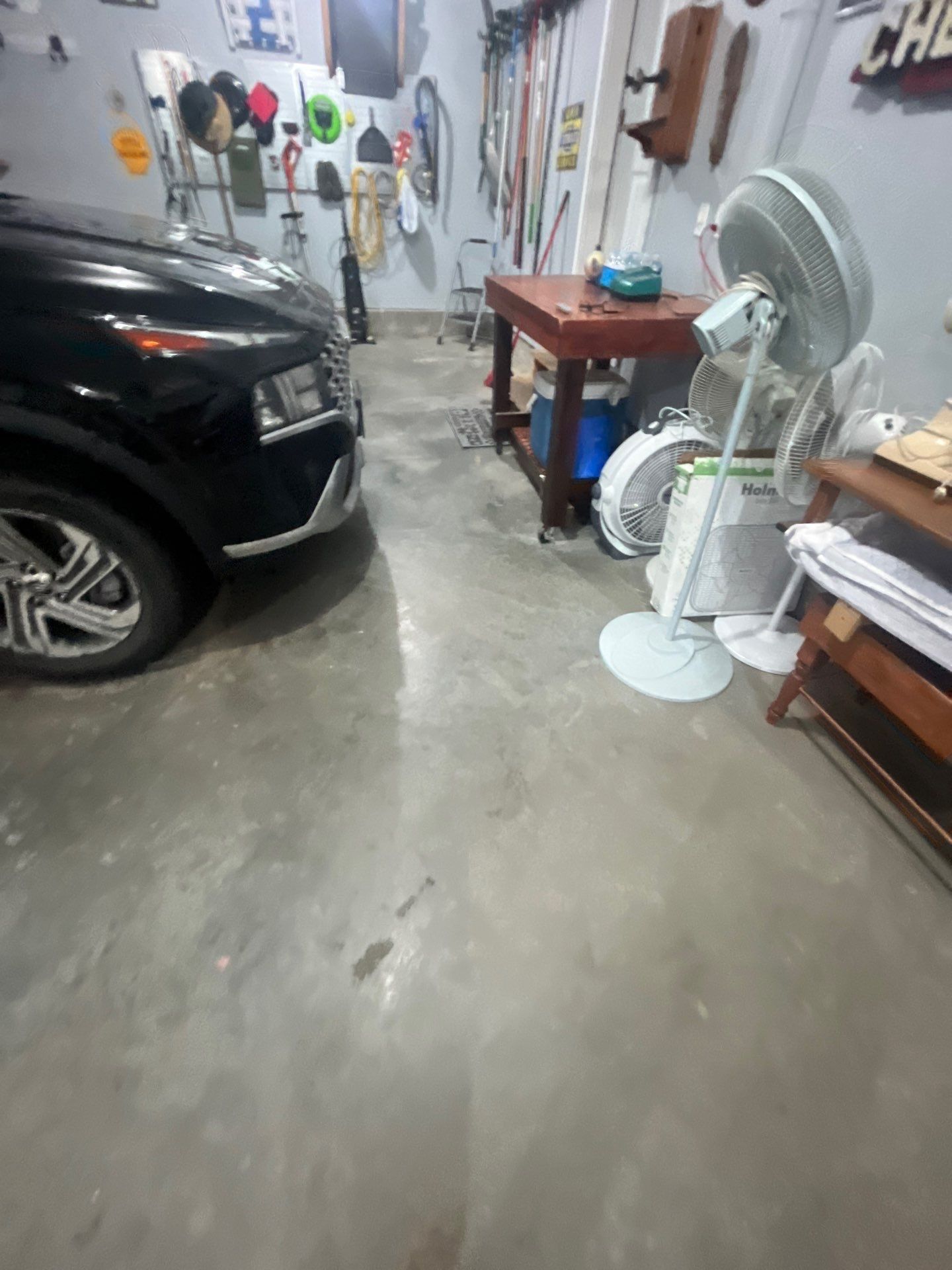 High-Gloss Epoxy Garage Floor Coating in Sioux Falls by Select Painting, Coatings & Garage Cabinets