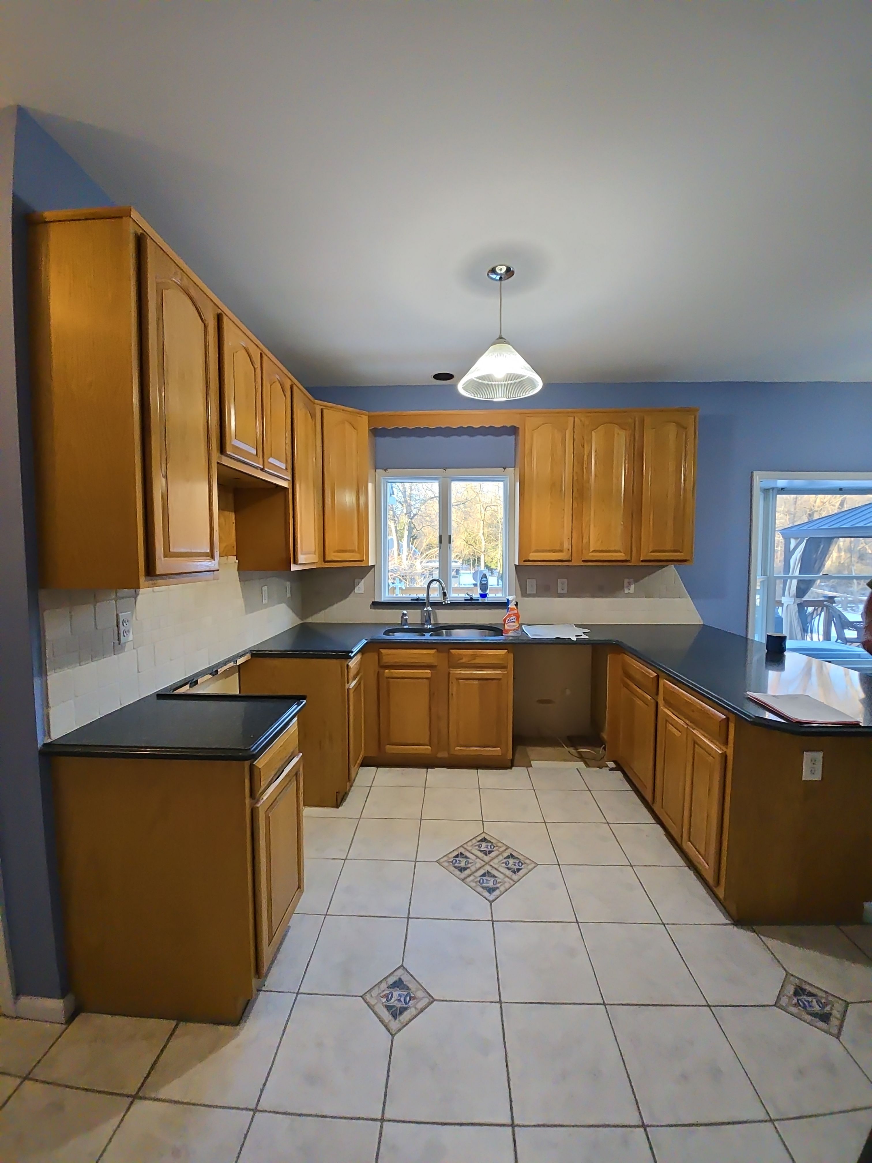 Cabinet Refinishing using Benjamin Moore Command by Spectrum Painting, LLC