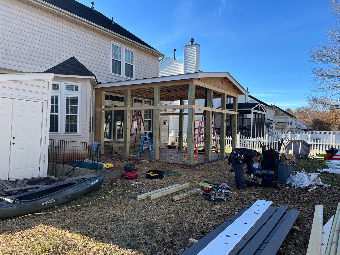 Custom Screened-In Porch with Stamped Concrete Patio in Warrenton by Jakari Restoration & Construction LLC