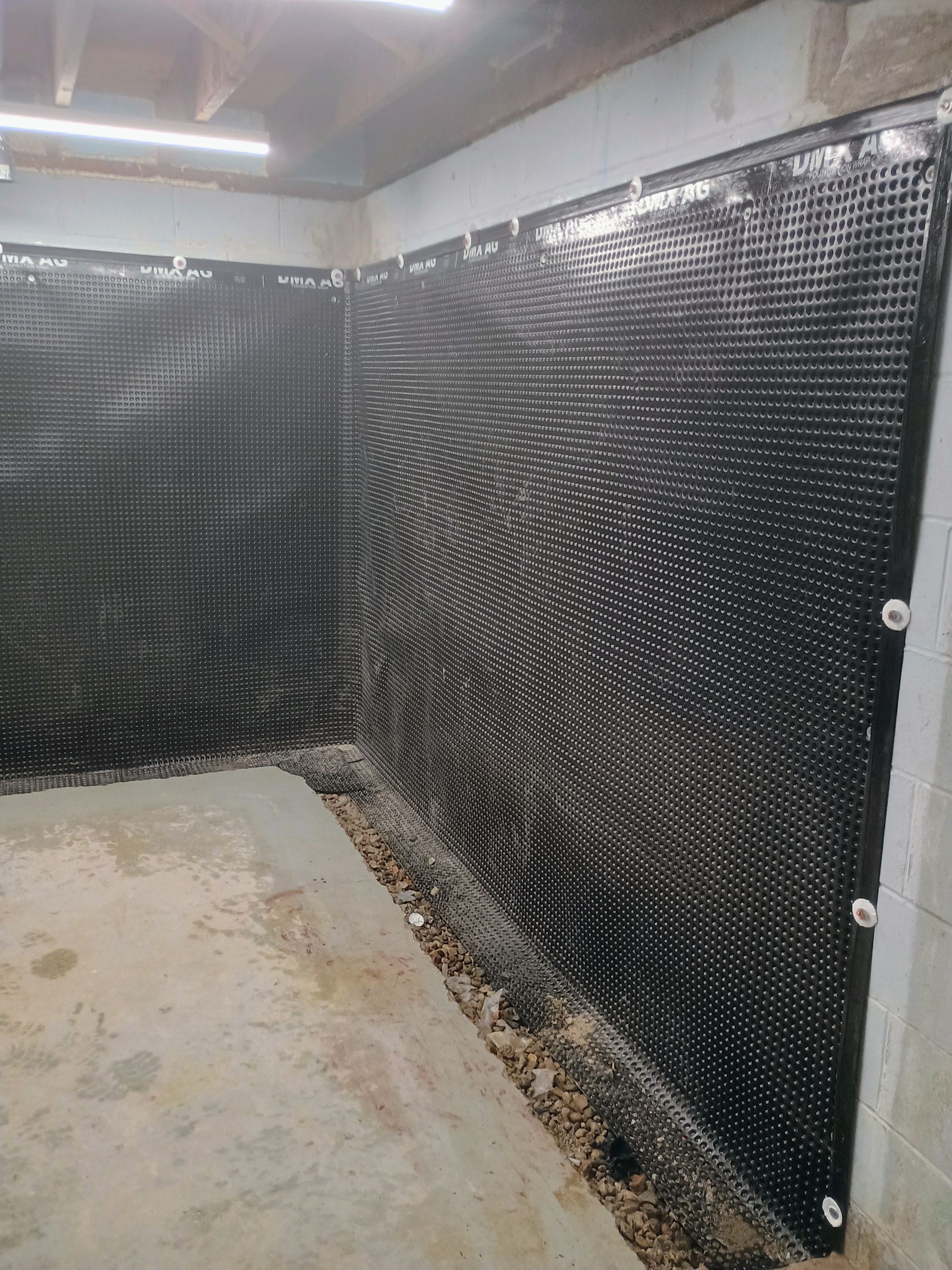 Depressurizing Denny's Basement Wall by Waterproofing Northeast