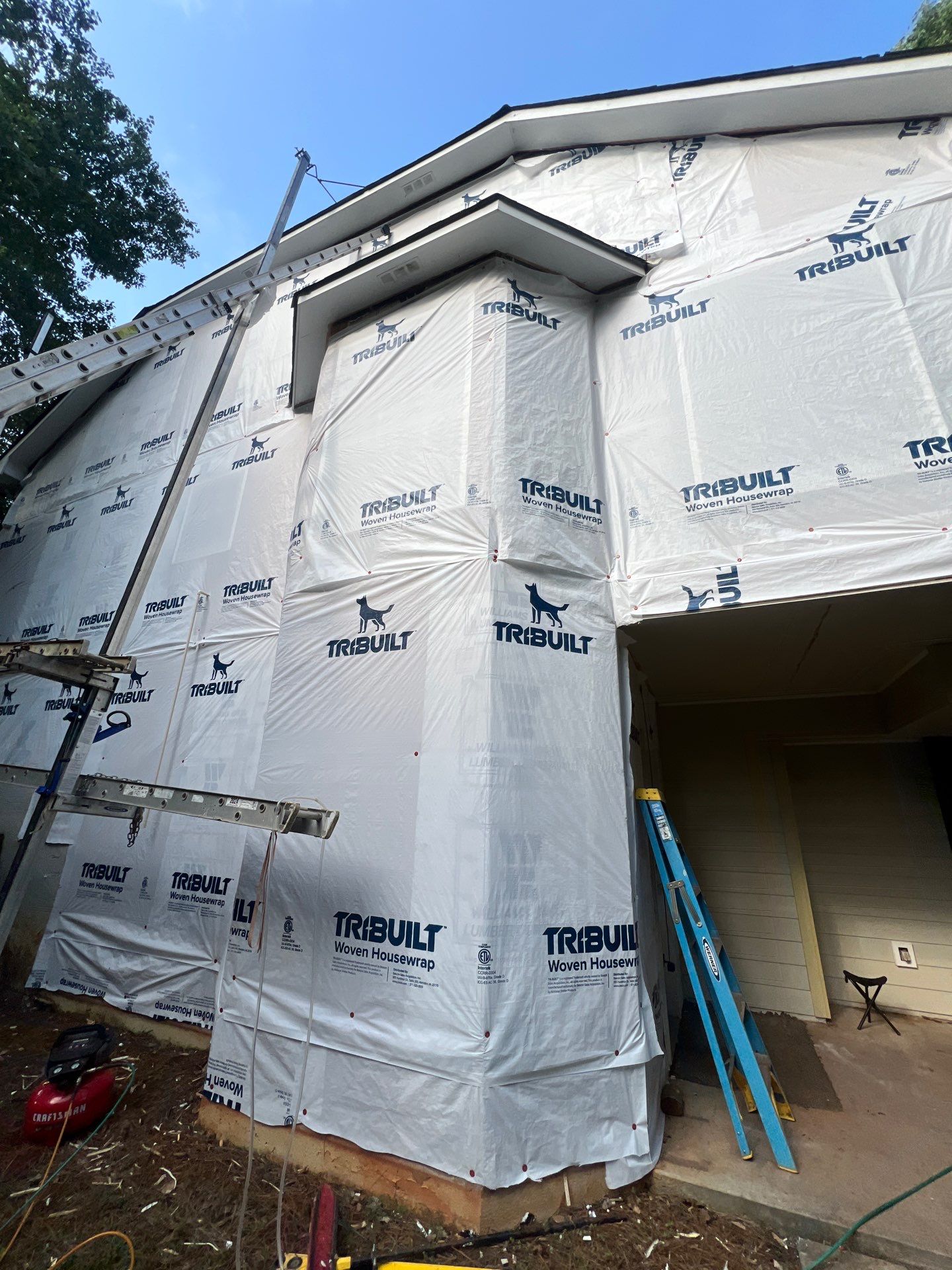 Blue Exterior Paint and Siding Installation using James Hardie Lap Siding by Nelson Exteriors