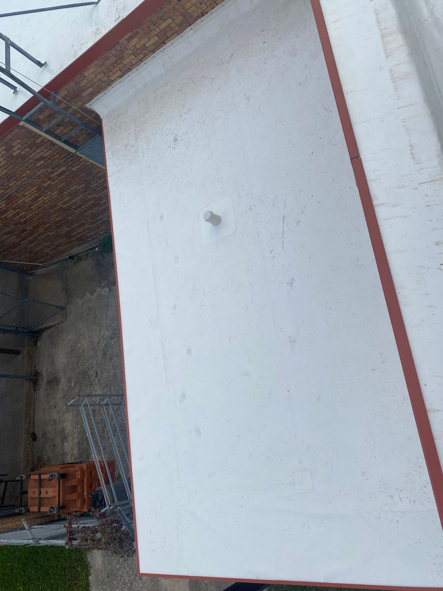 San Antonio Post Office Recover with a 20 year NDL warranty by Grell Roofing, LLC