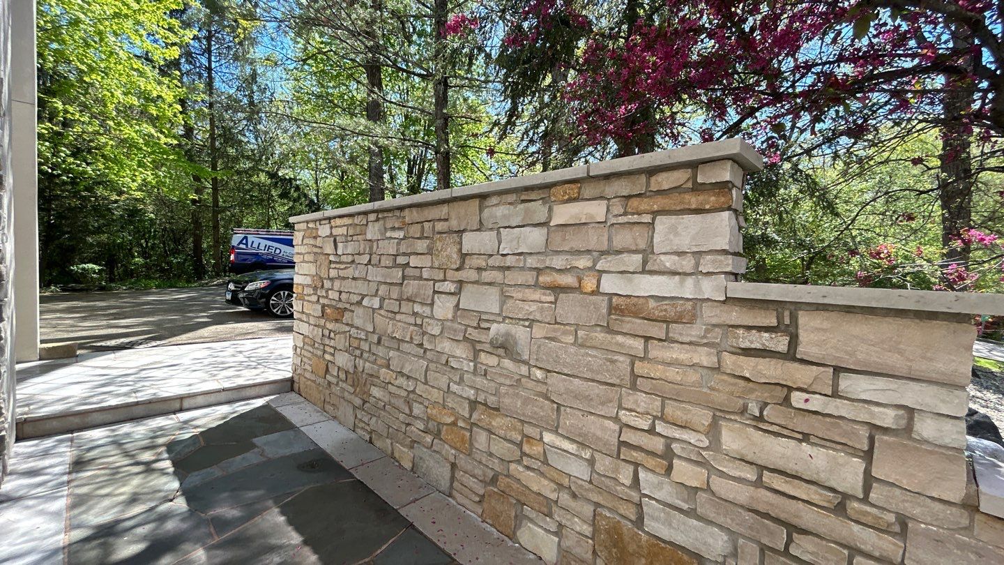 natural stone using Algaecide, soft wash soap by Northern Power Washing LLC.