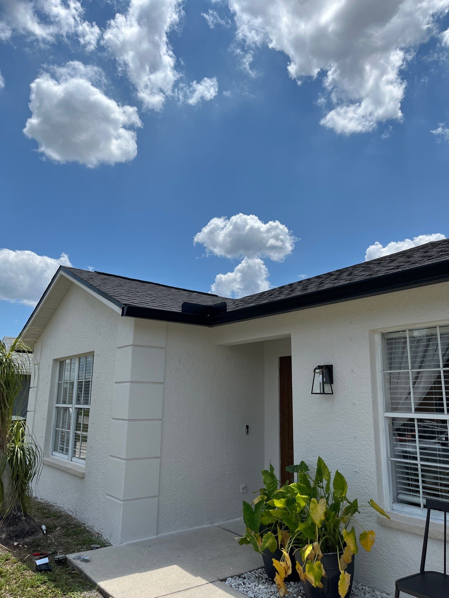 Black Seamless Gutters and Downspouts in Fort Myers FL by Gutter Professors