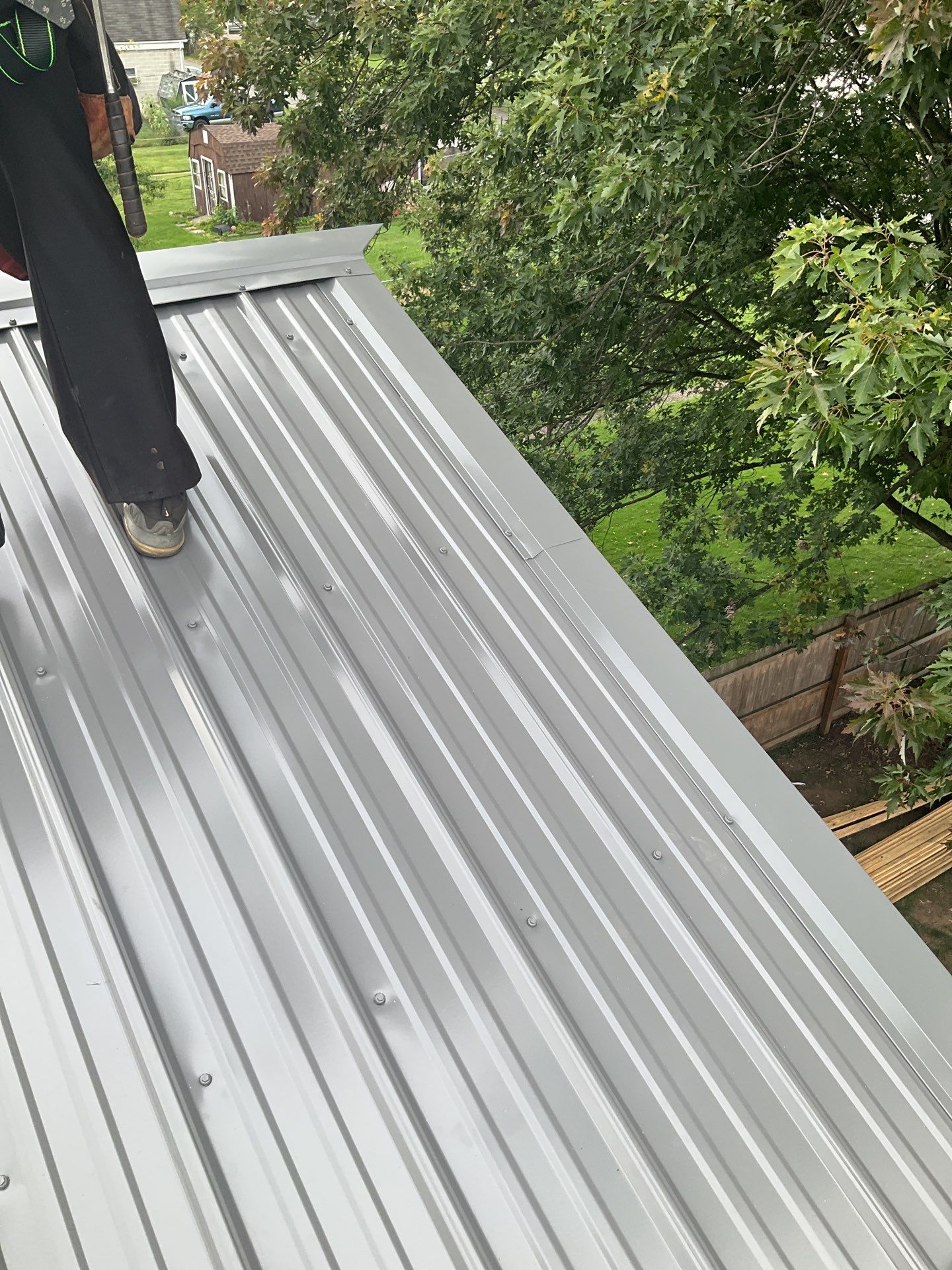 Charcoal Metal Roof & Blue Siding — A Refreshing New Look by Esh Builders