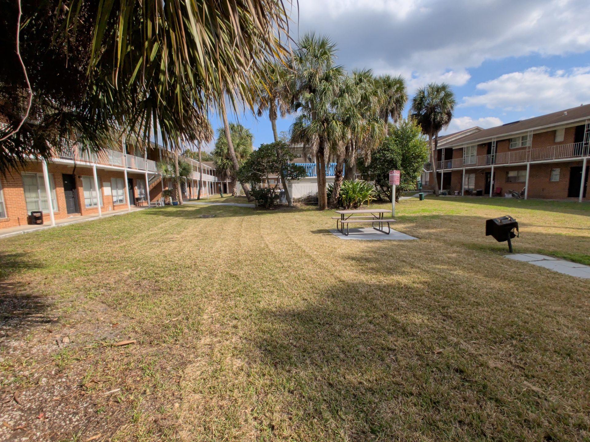 Apartment Landscape Cleanup & Ongoing Grounds Maintenance — Cimarron Apartments (Arlington) by Harmoni Home Services