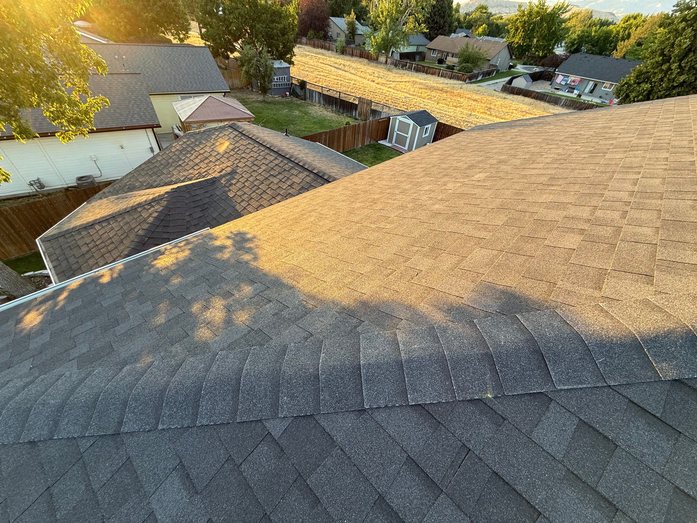 Residential Roof Replacement and Seamless Gutter Installation in Boise by Olive Roofing