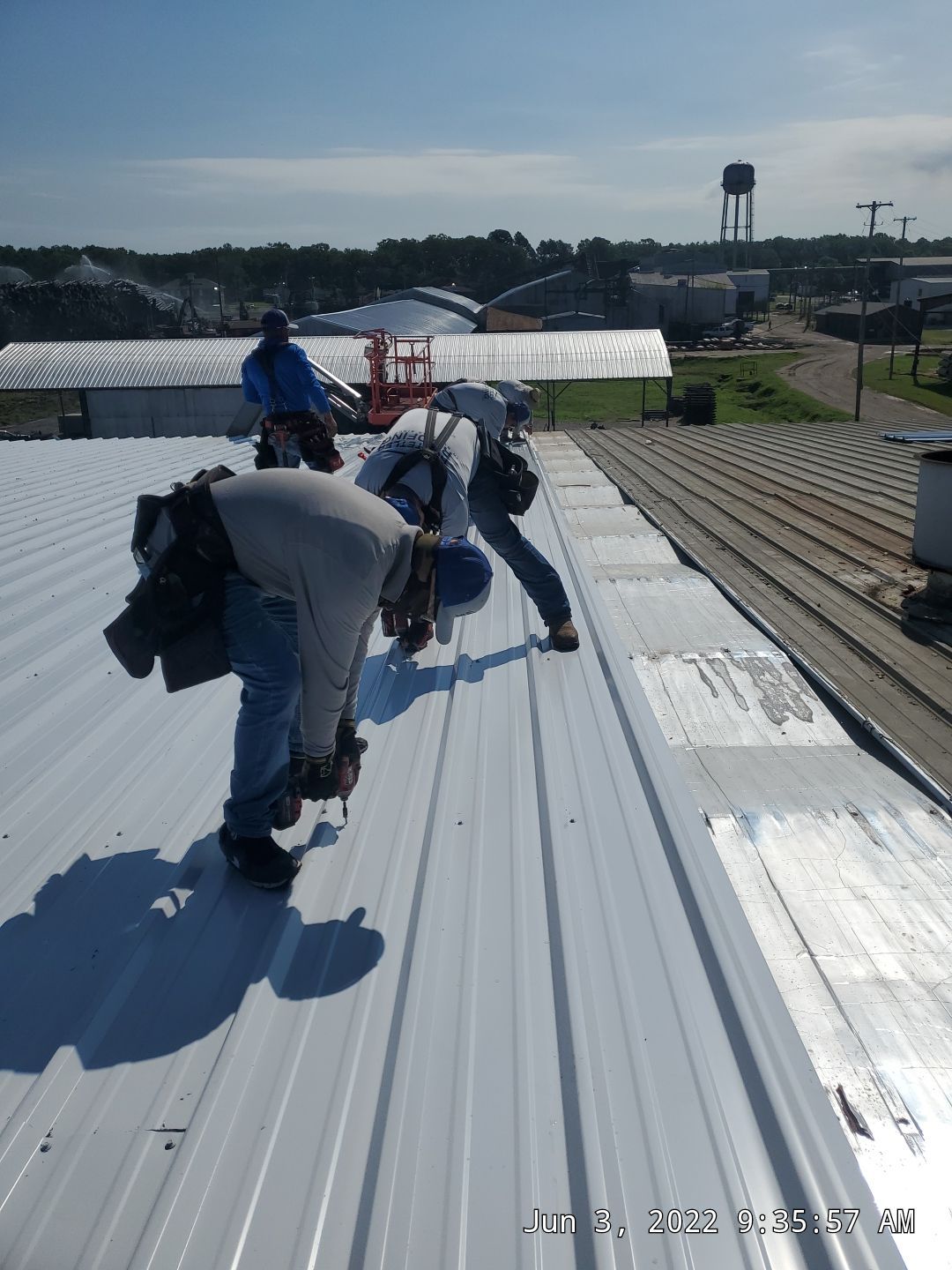 Commercial Roofing Installation using Aluminum Roofing panels by Hostetler Roofing