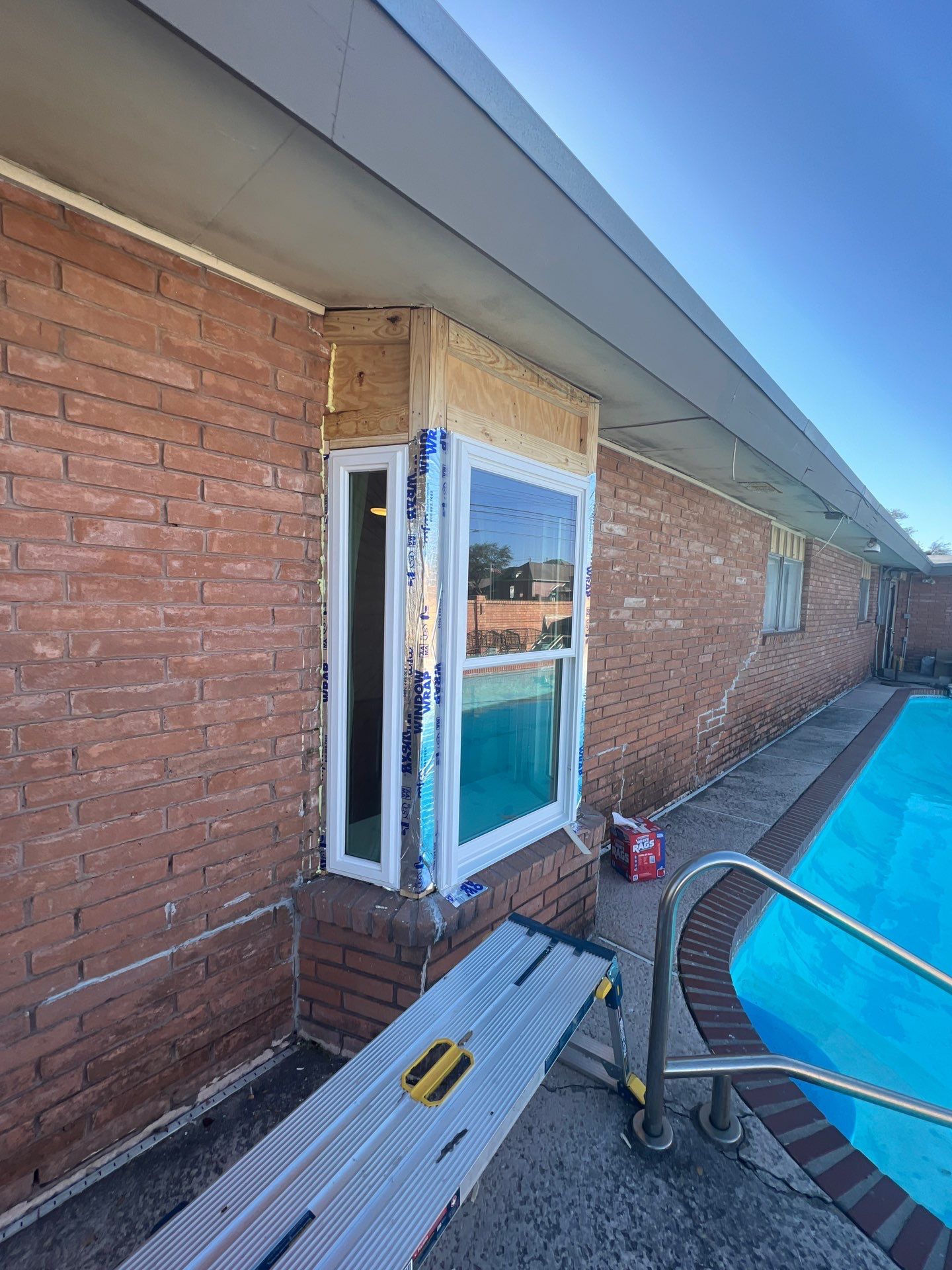 Windows in Brick with a Bay Window by Bayfront Roofing and Construction