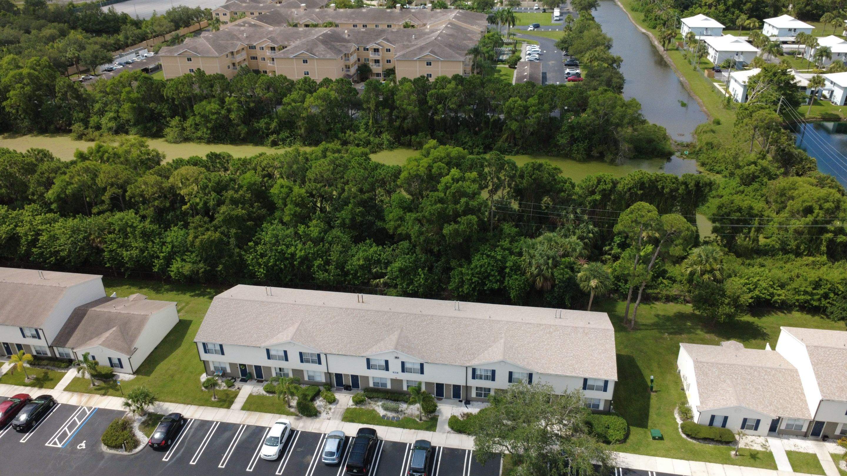 Apartment Complex Shingle Roof Replacement by Sailfish Roofing