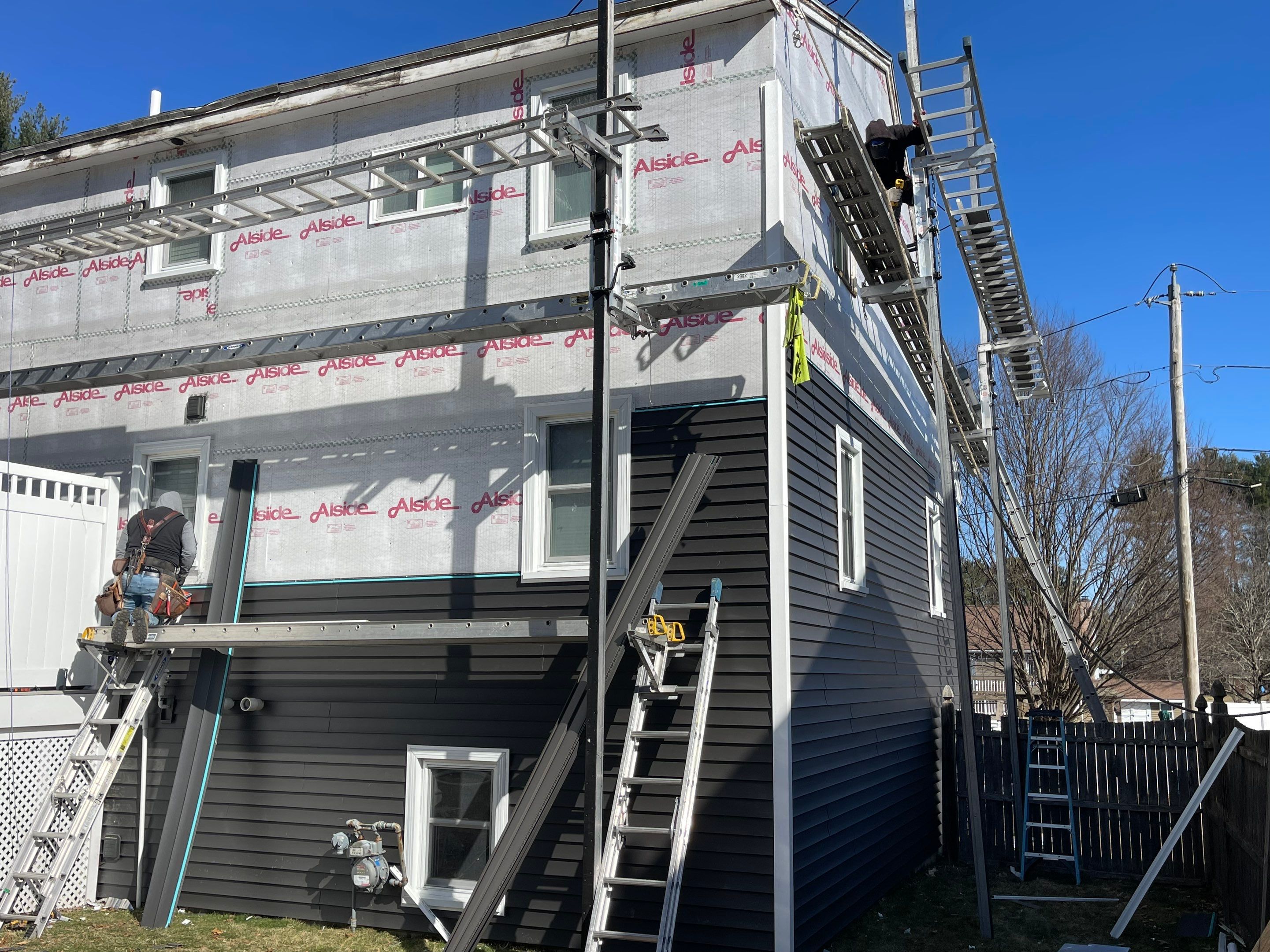 Complete Exterior Renovation with New Siding & Gutters   by Sensible Home Solutions