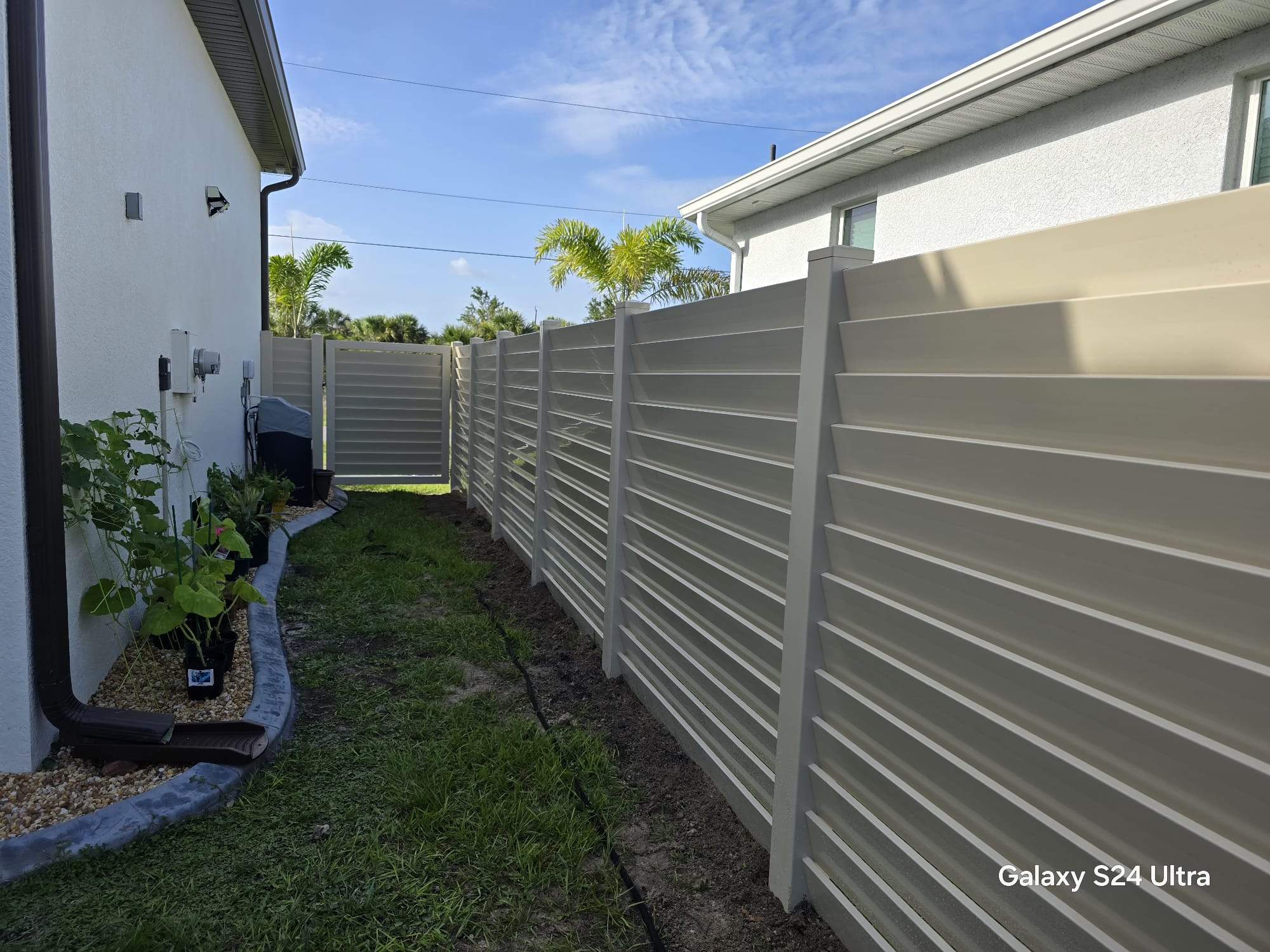Tan Louvered Vinyl in Port Charlotte by True Fence LLC