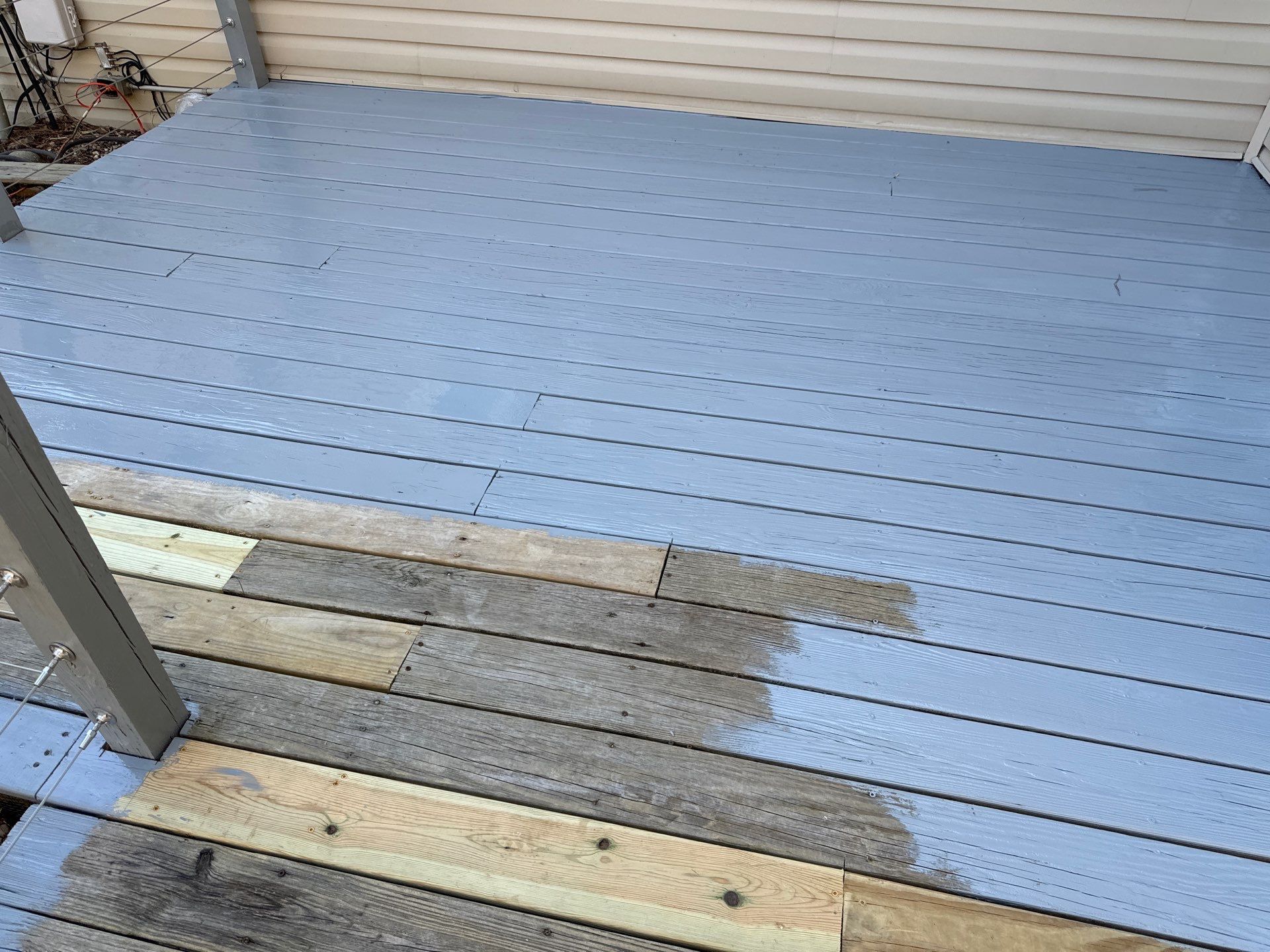 Deck staining by GonzalezPainters & Contractors Inc 