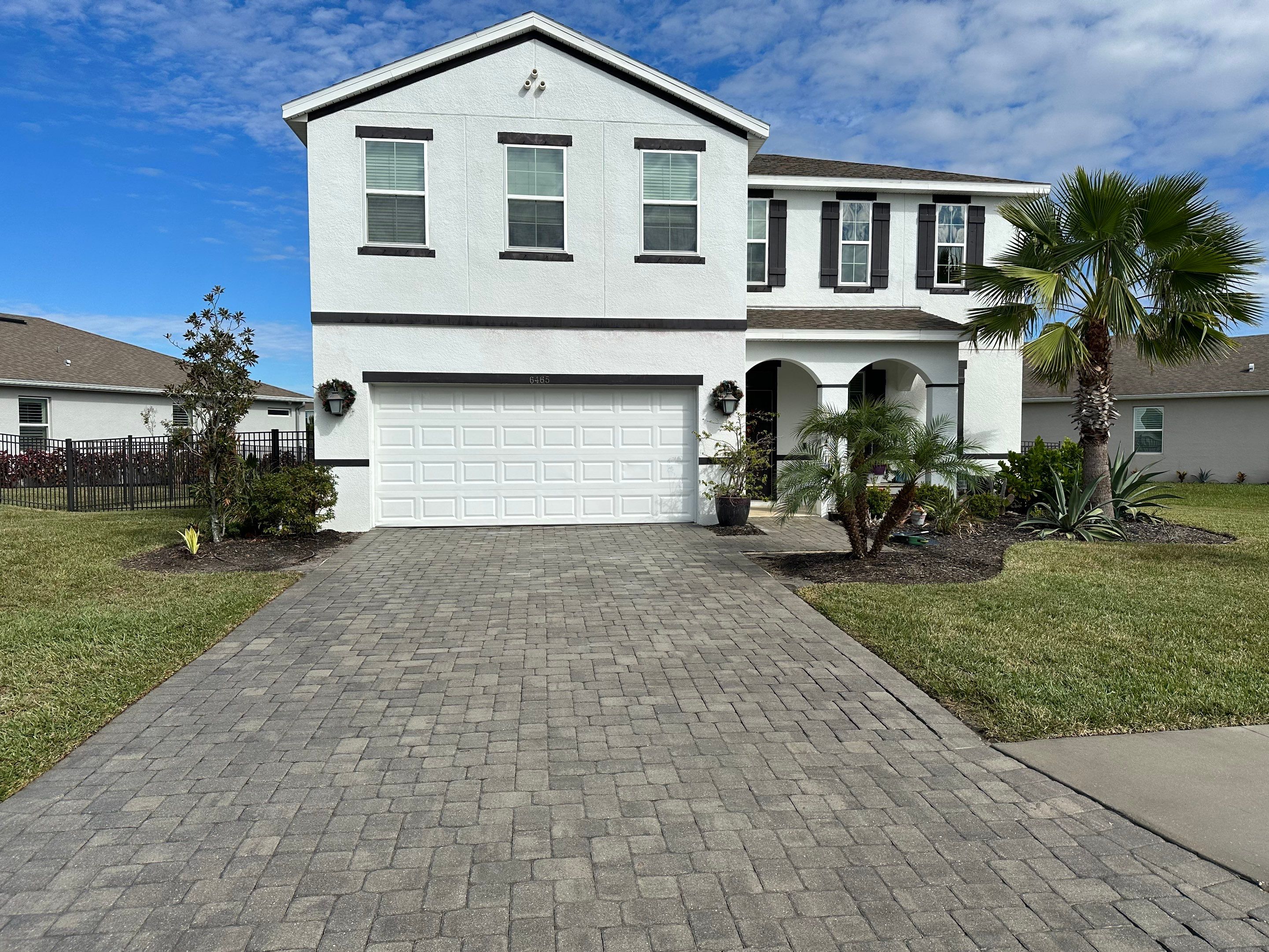 2-Story House Wash & Paver Driveway Cleaning in Trevesta Community, Palmetto, FL | Sunshine AquaWash by Sunshine AquaWash