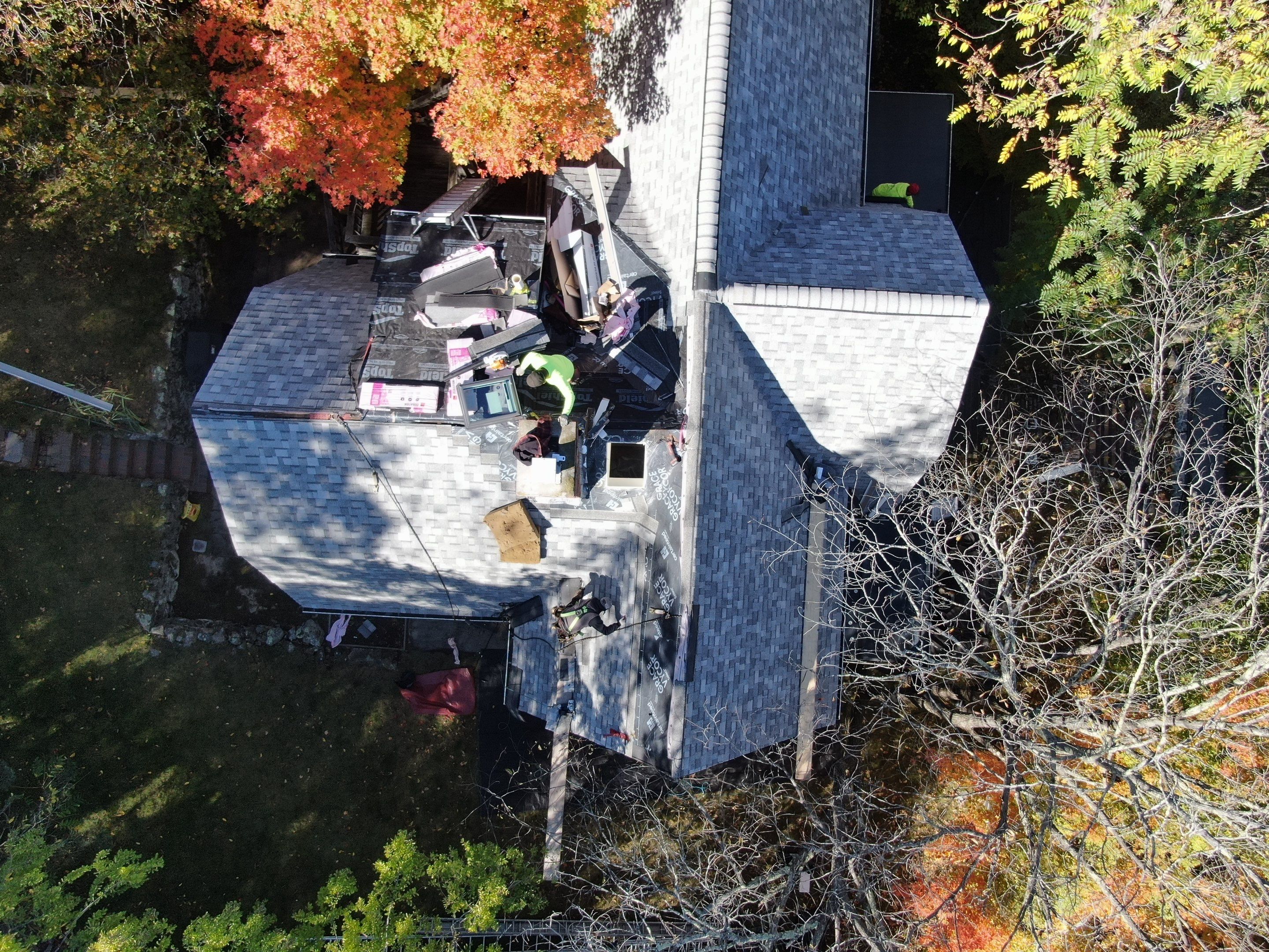 Full Roof & Porch EPDM Replacement with Skylight and Chimney Repairs by Mighty Dog Roofing of Greater Middlesex County